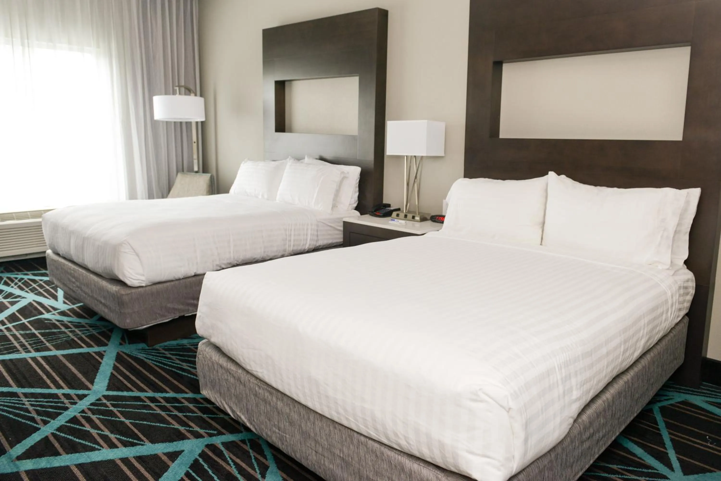 Photo of the whole room, Bed in Holiday Inn Express & Suites - Charlotte Airport by IHG
