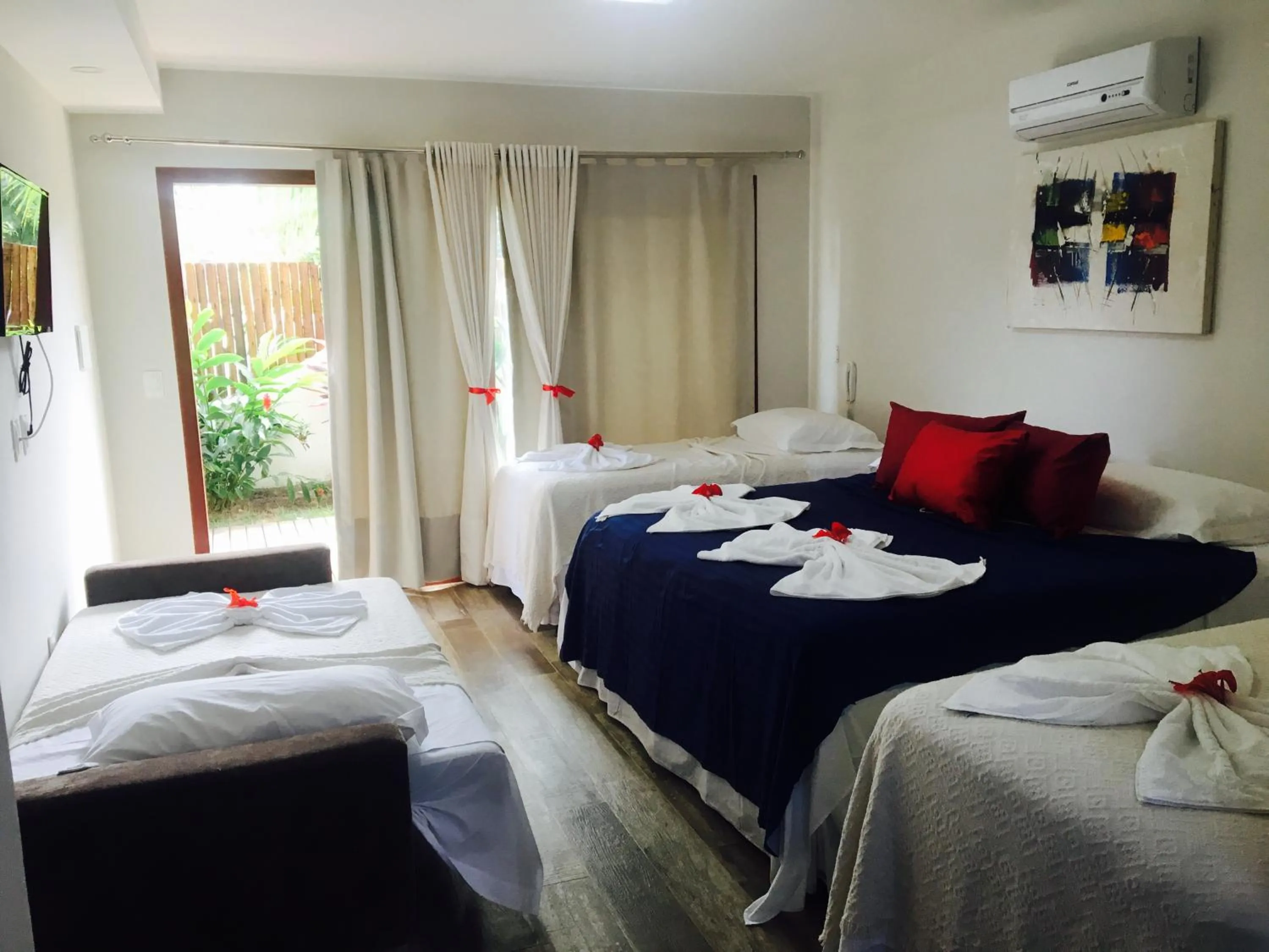 Bed in Pousada Waikiki Boutique