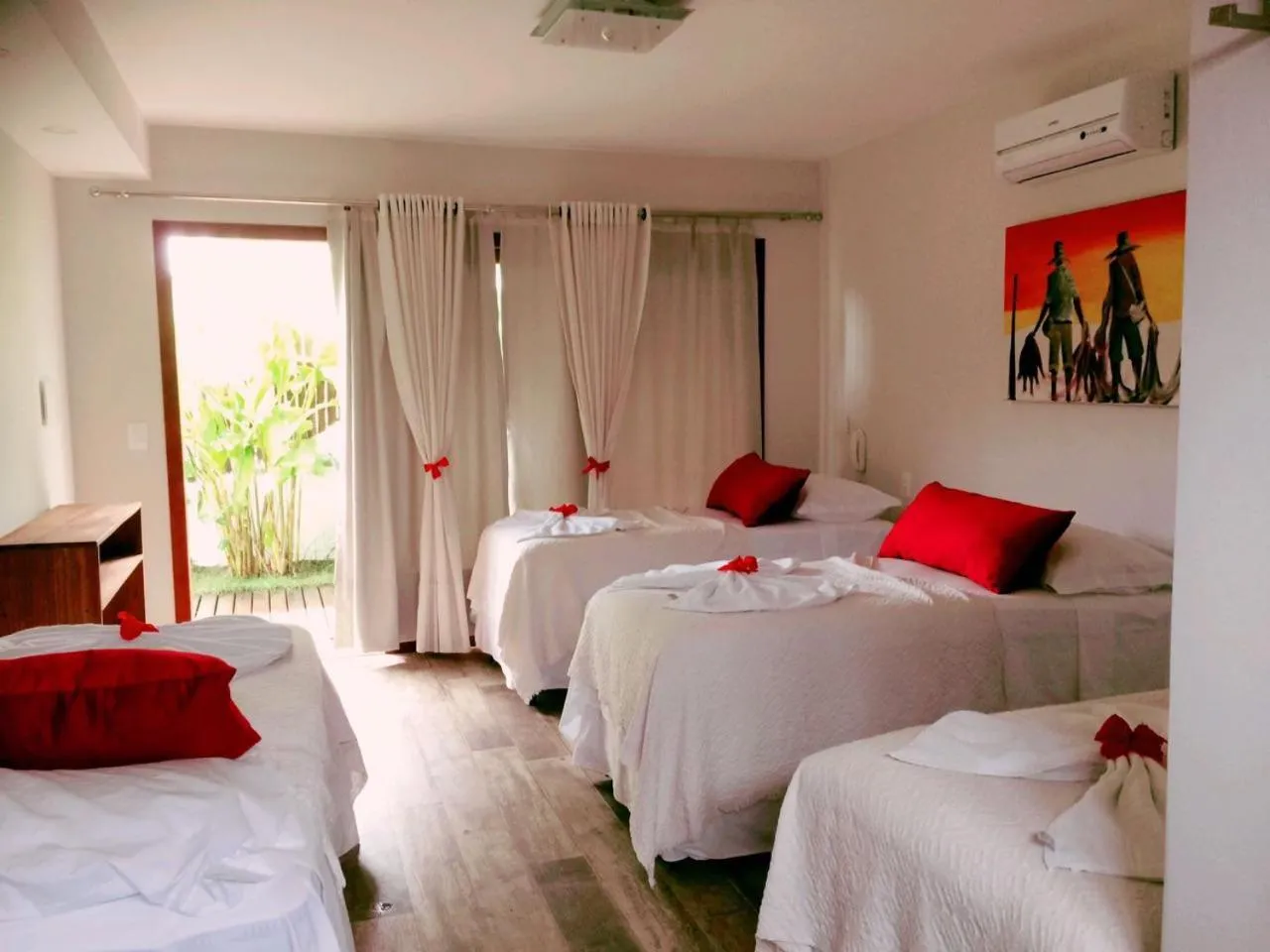 Bed in Pousada Waikiki Boutique