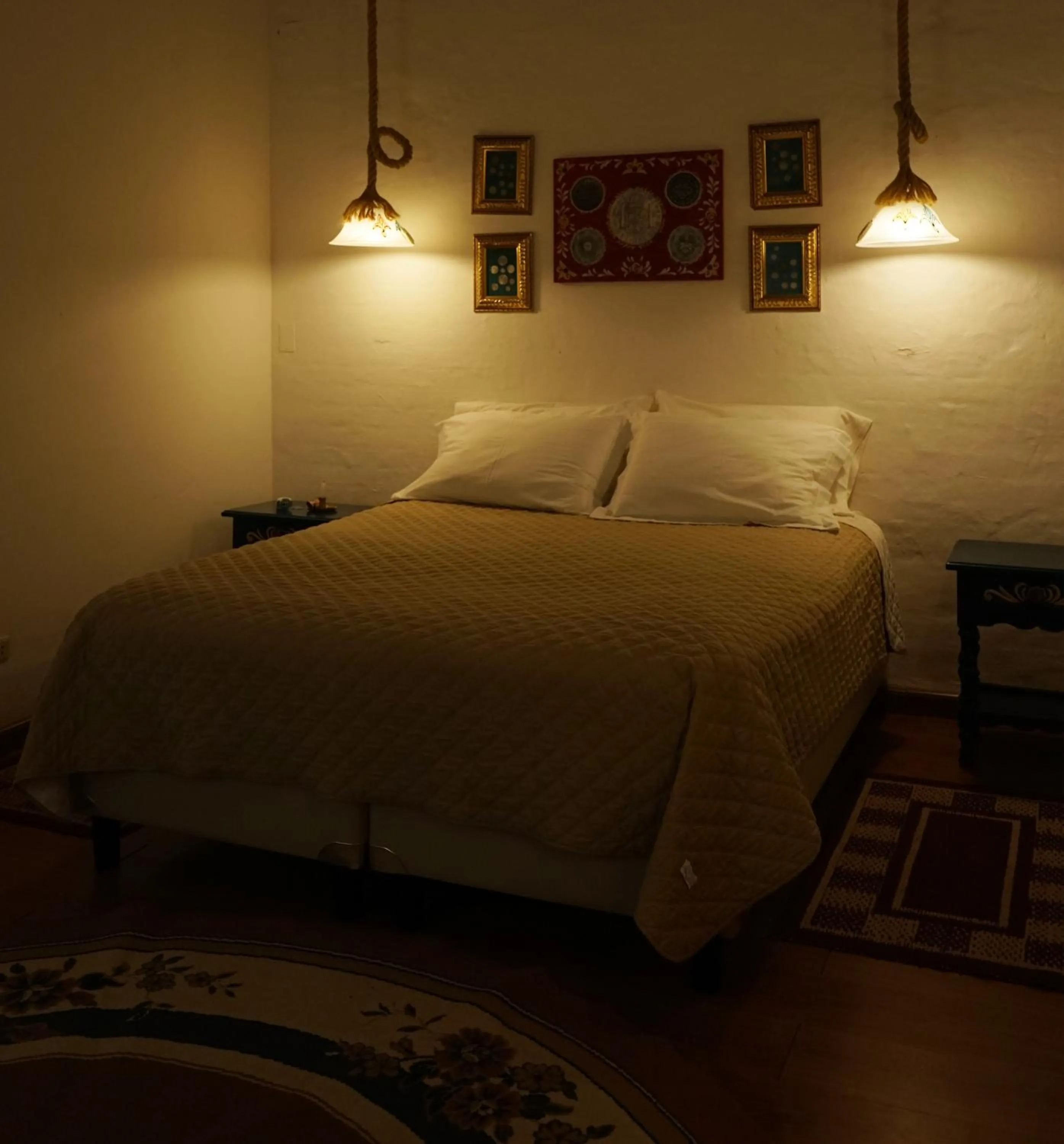 Bed in El Pueblito Hotel Boutique