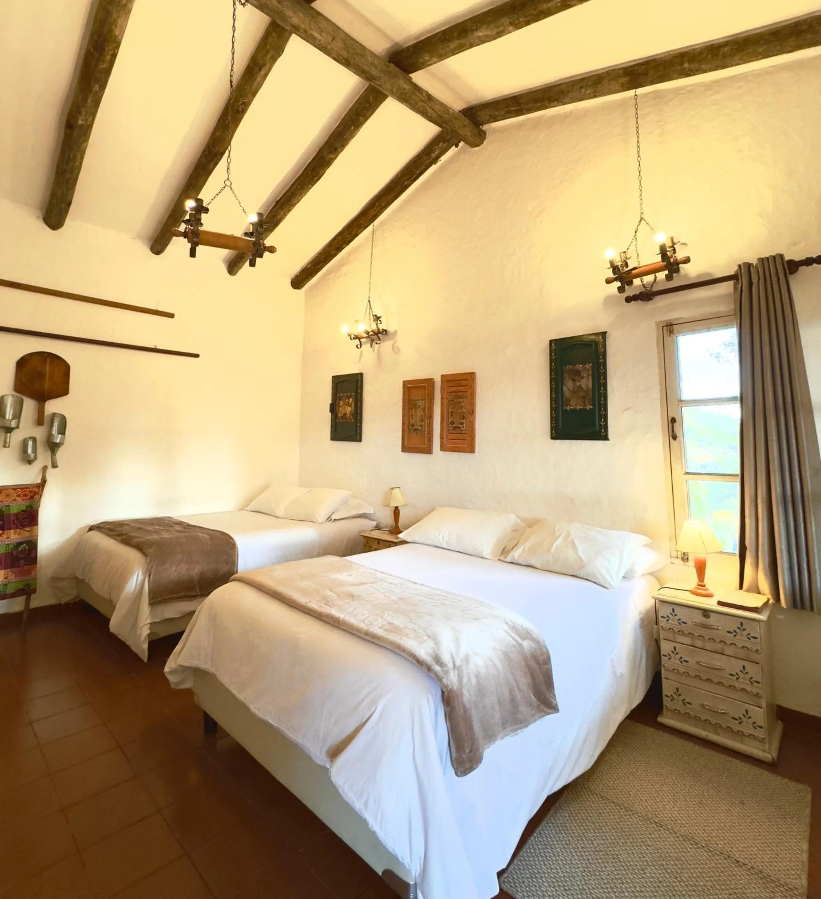 Bed in El Pueblito Hotel Boutique