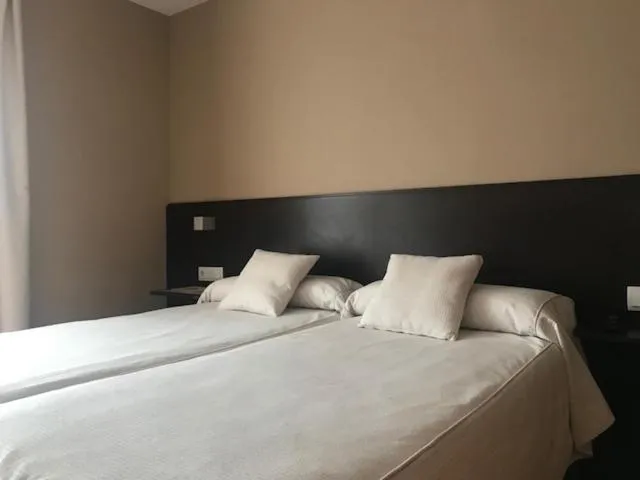 Photo of the whole room, Bed in Hotel Esquirol