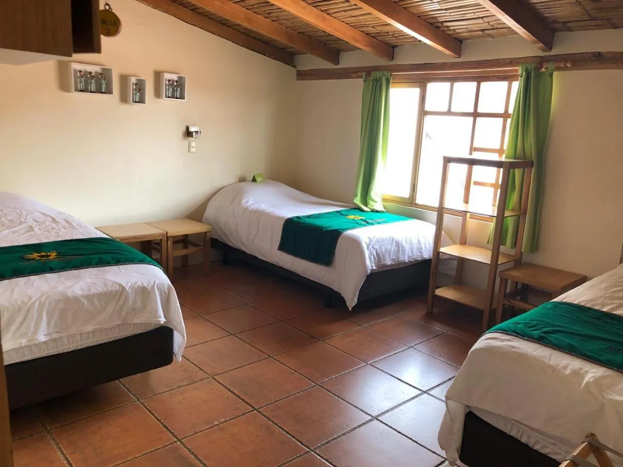 Bed in Inti Sisa Art Guesthouse