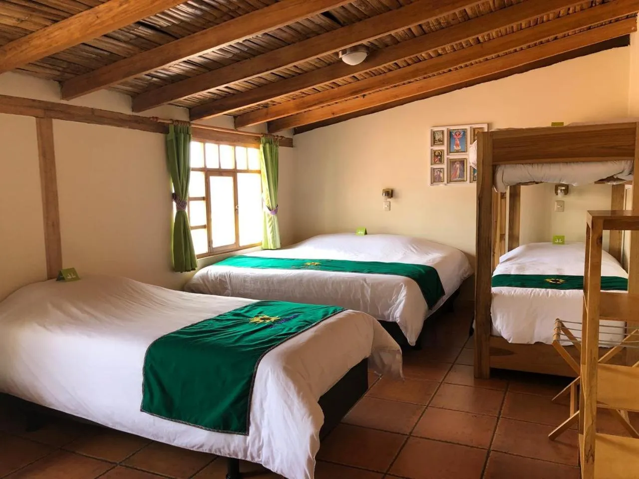 Bed in Inti Sisa Art Guesthouse