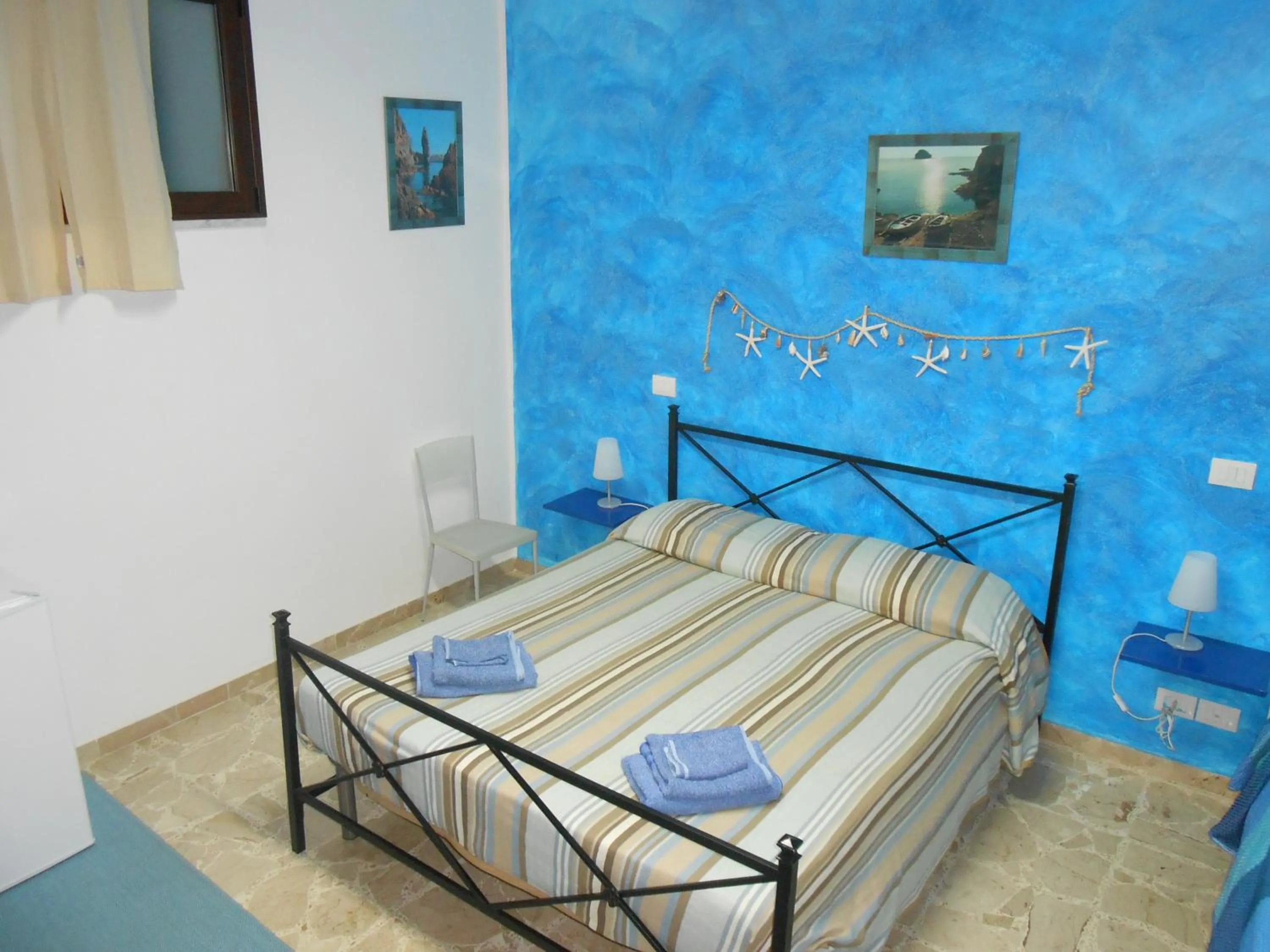 Bedroom in B&B Ro.Ma.