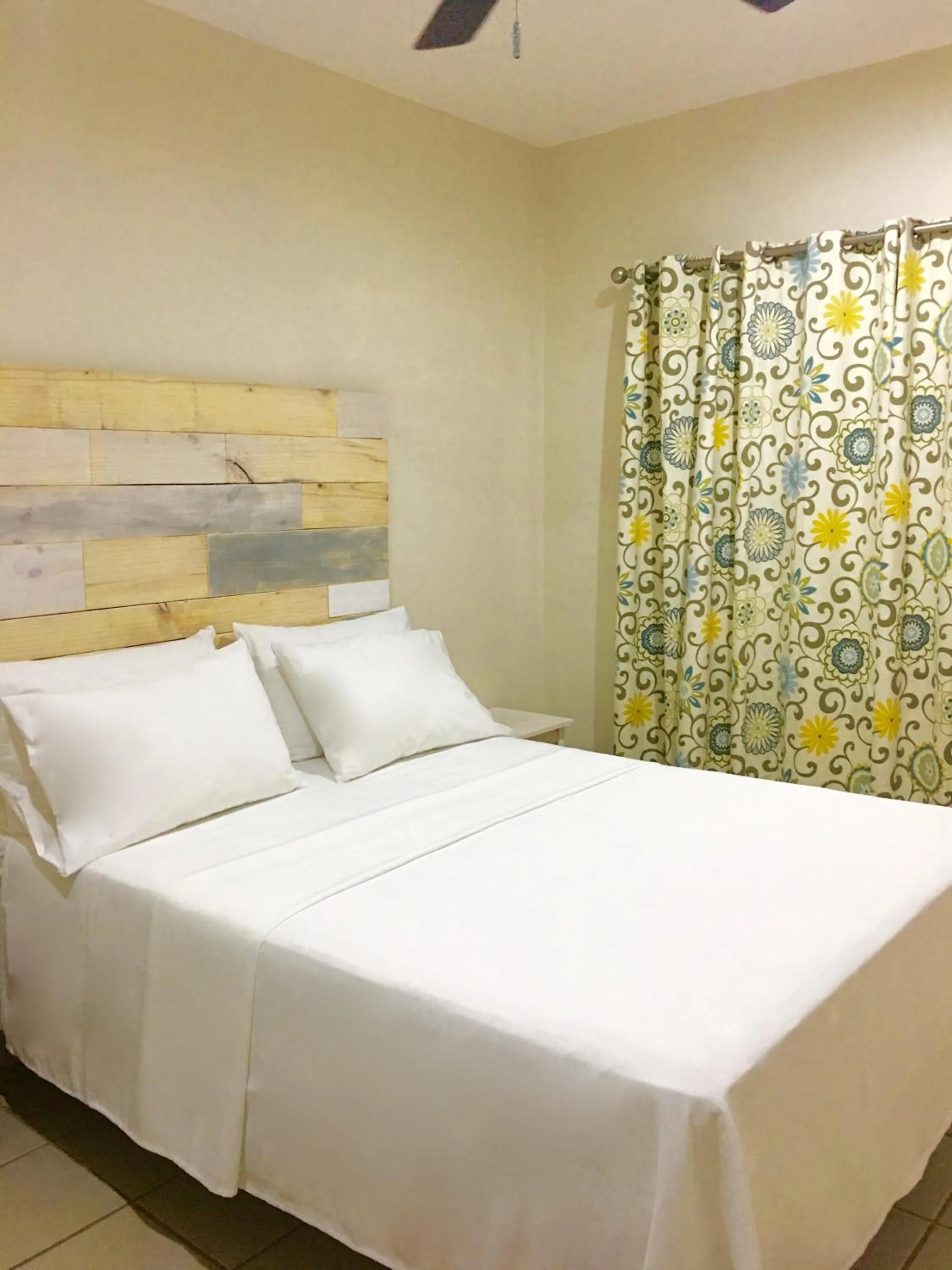 Bed in Ten North Tamarindo Beach Hotel