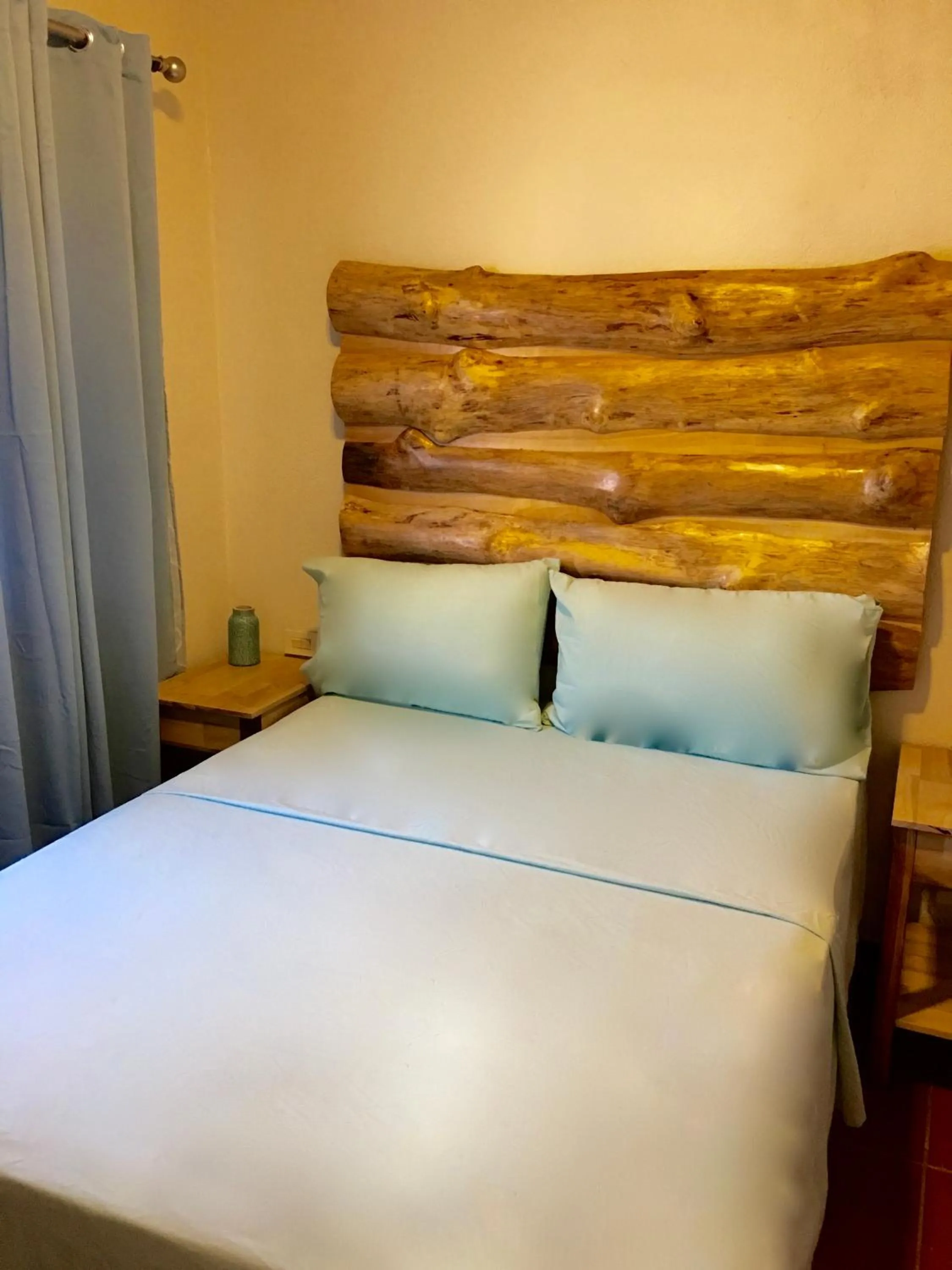 Bed in Ten North Tamarindo Beach Hotel