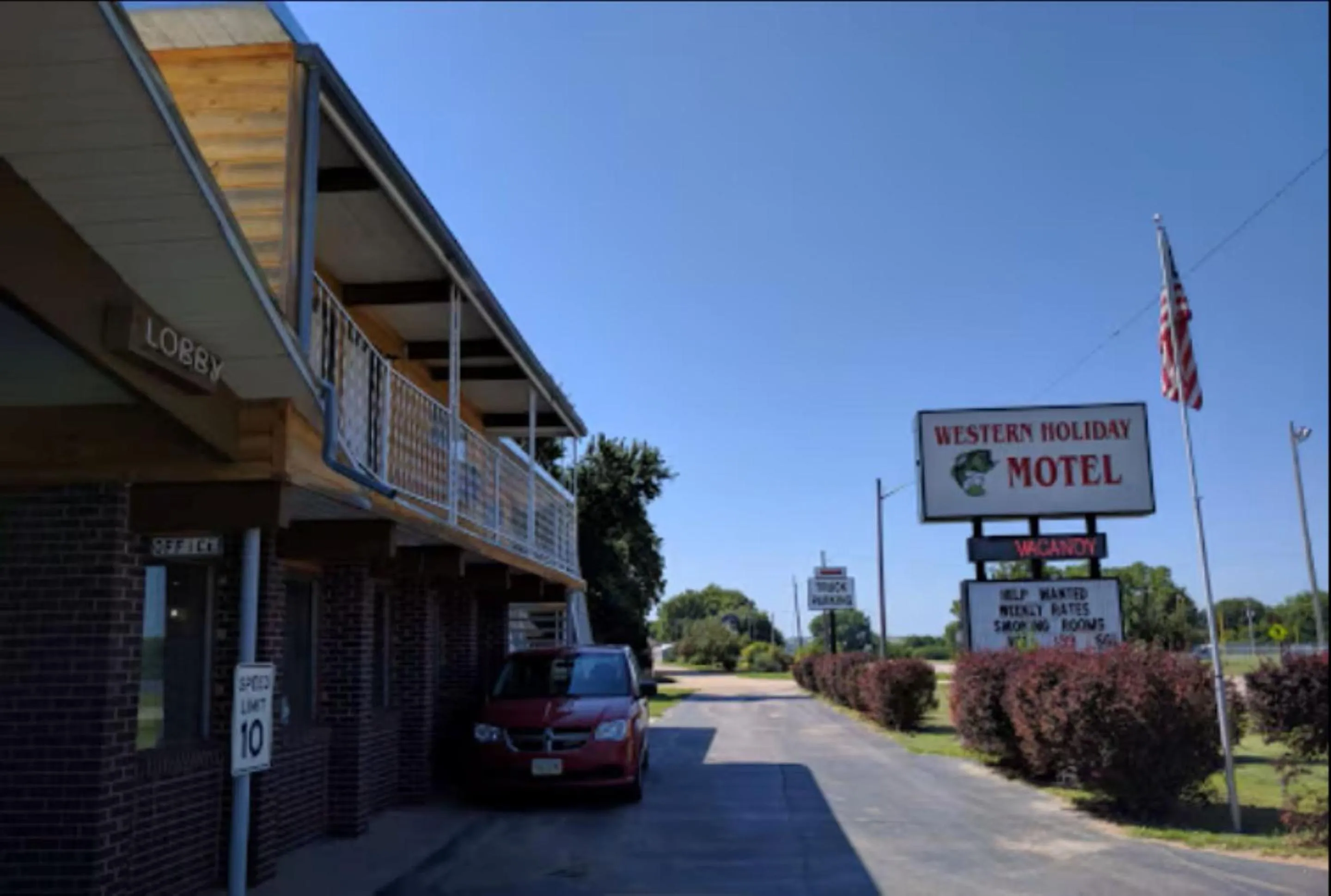 Facade/entrance in Love Hotels Western Holiday by OYO at Harlan Lake NE