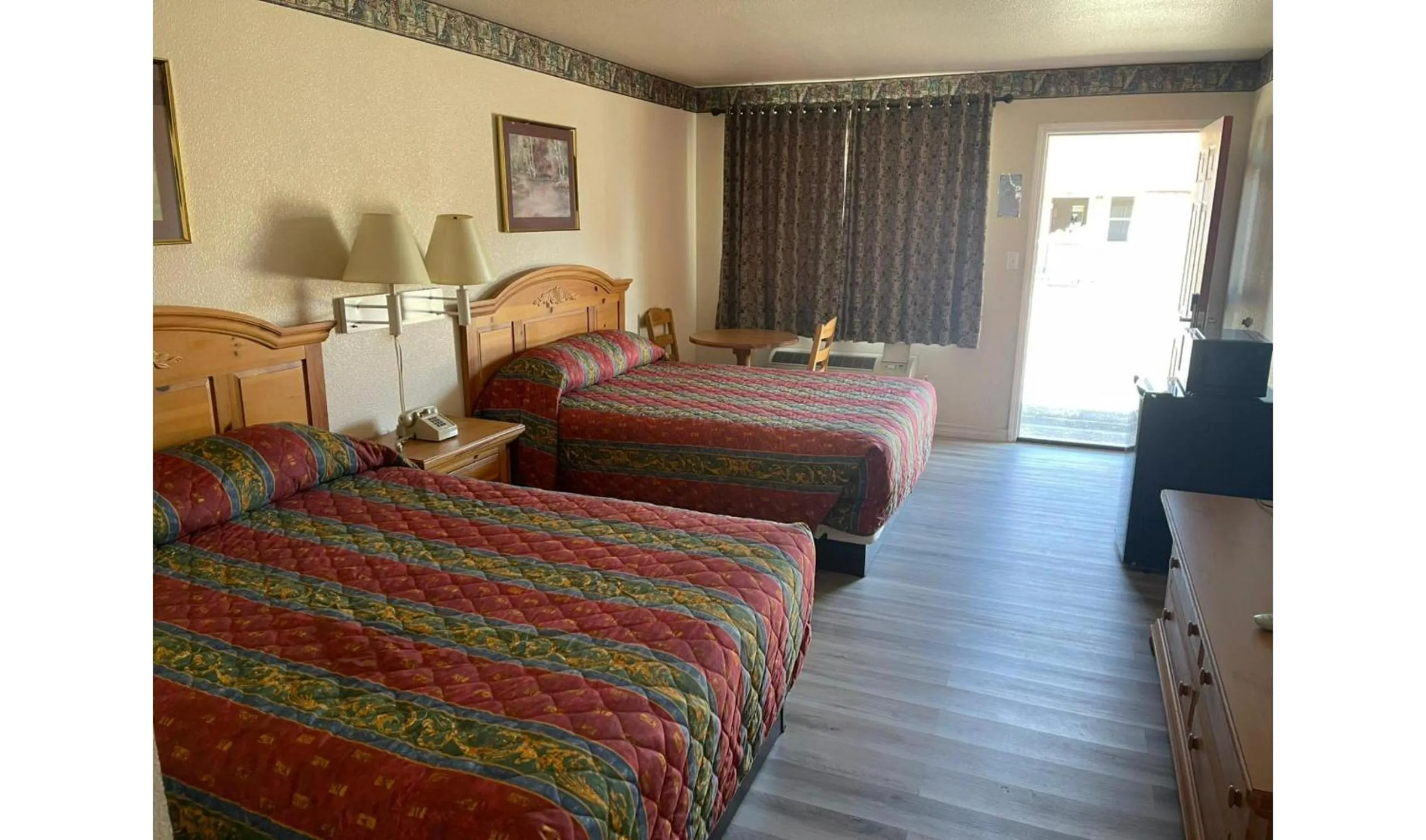 Bedroom, Bed in Lakeside inn & suites by OYO Mathis I 37