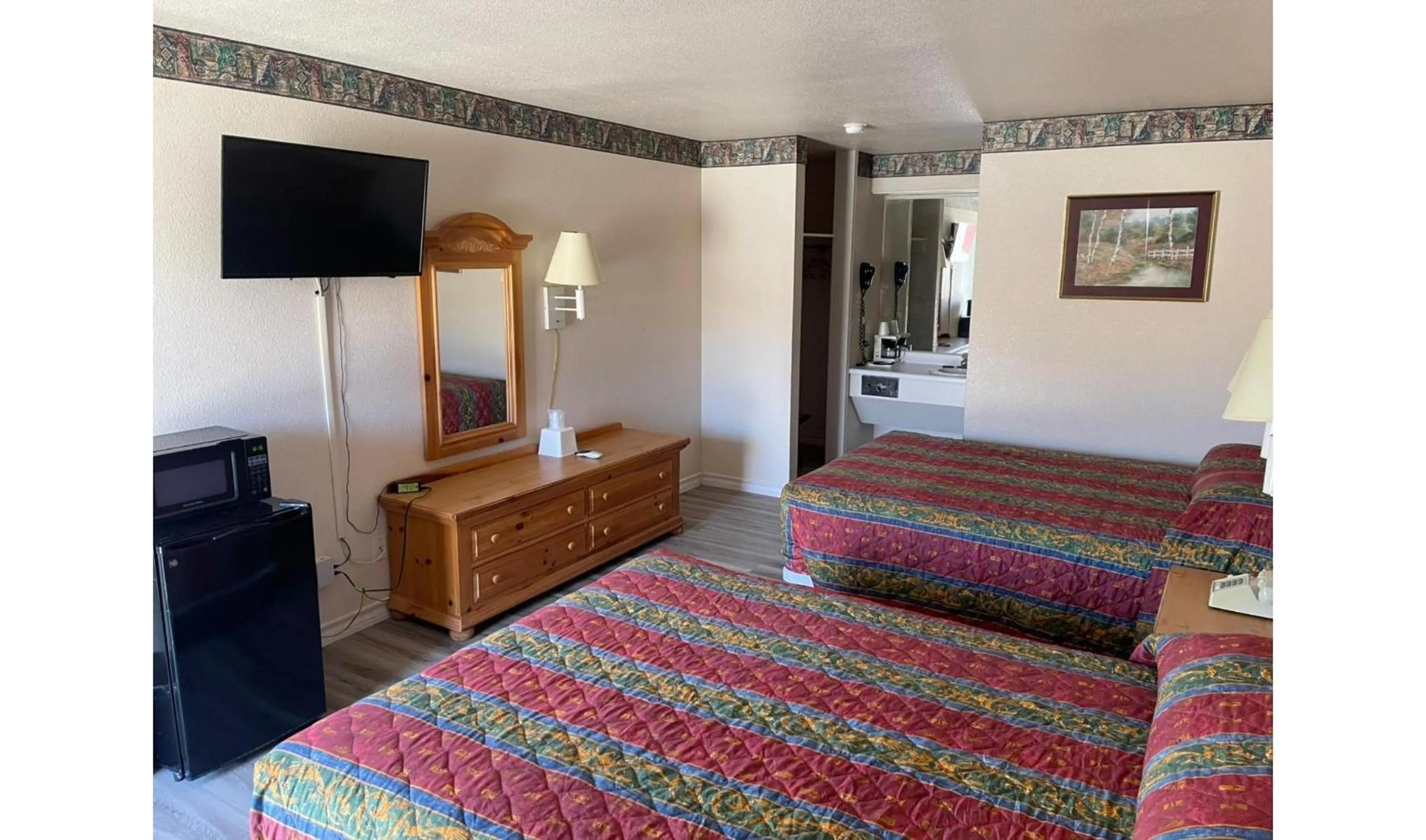 Bedroom, Bed in Lakeside inn & suites by OYO Mathis I 37