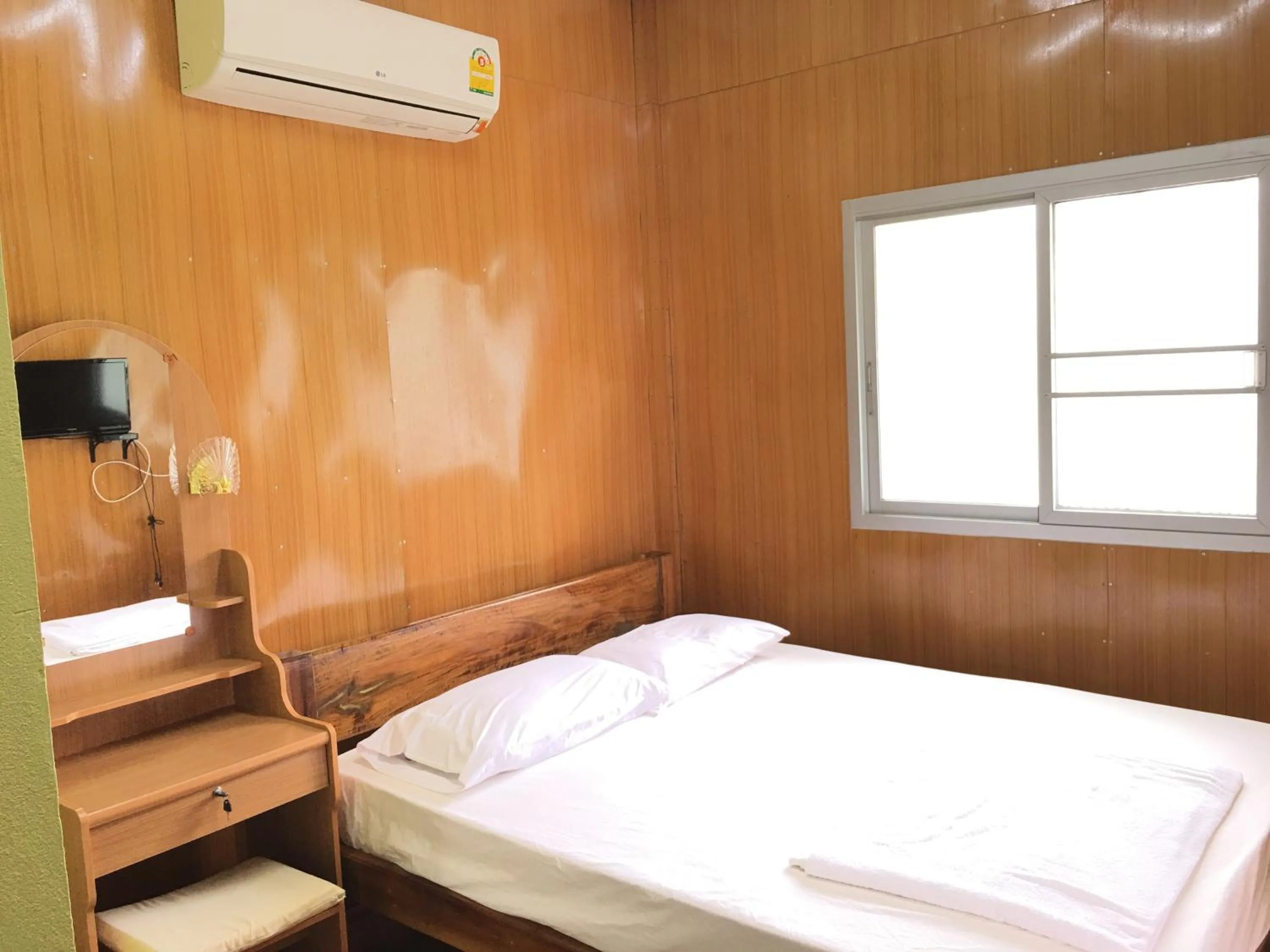 Bed in Baan Suan Kru Kob