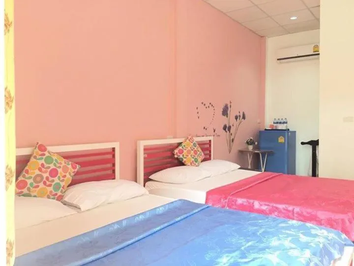 Bed in Baan Suan Kru Kob