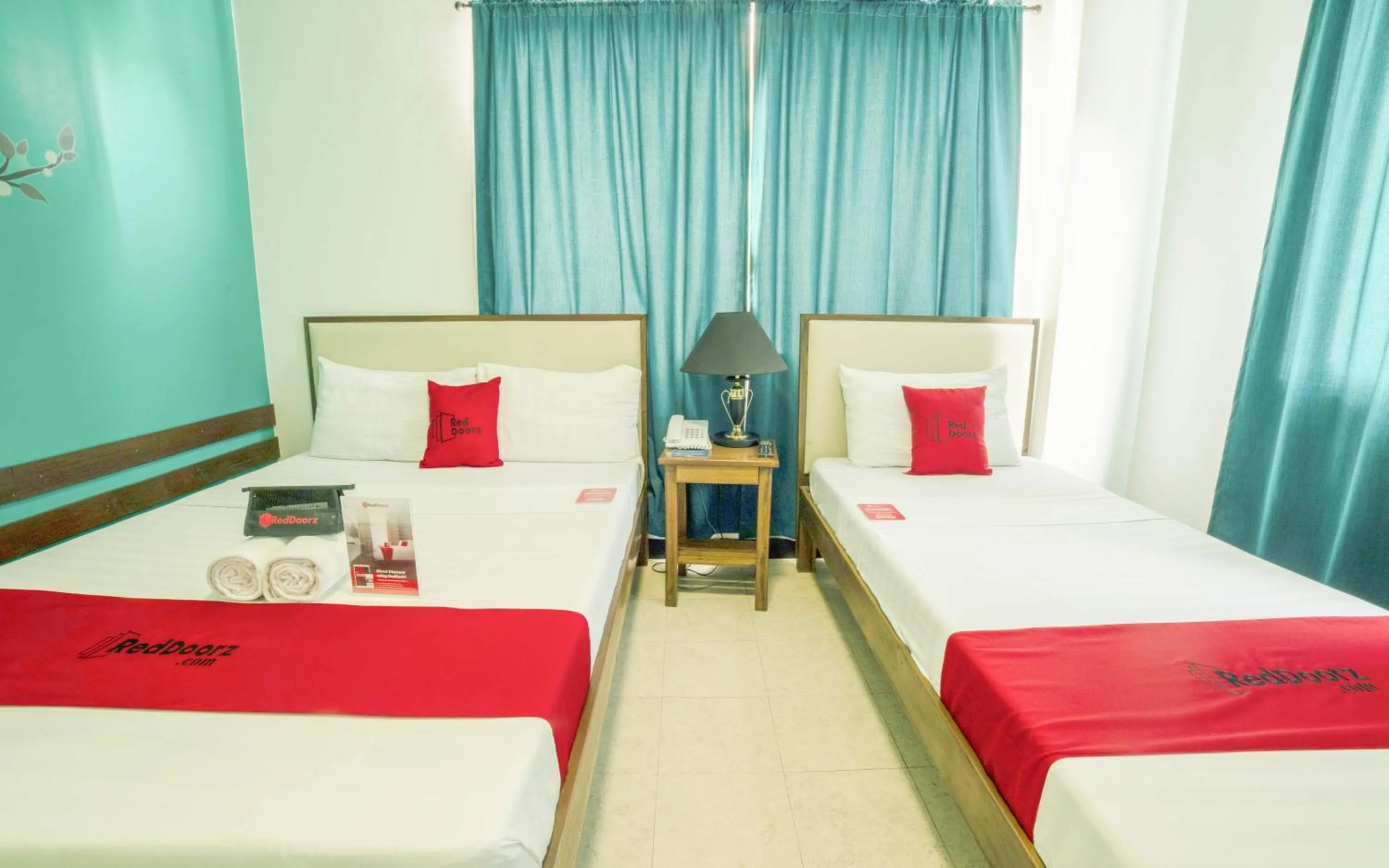 Bed in RedDoorz Plus near Rizal Junction
