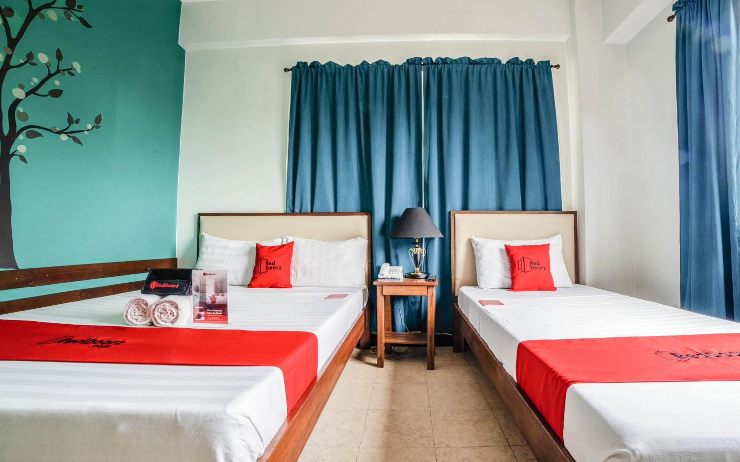 Photo of the whole room, Bed in RedDoorz Plus near Rizal Junction