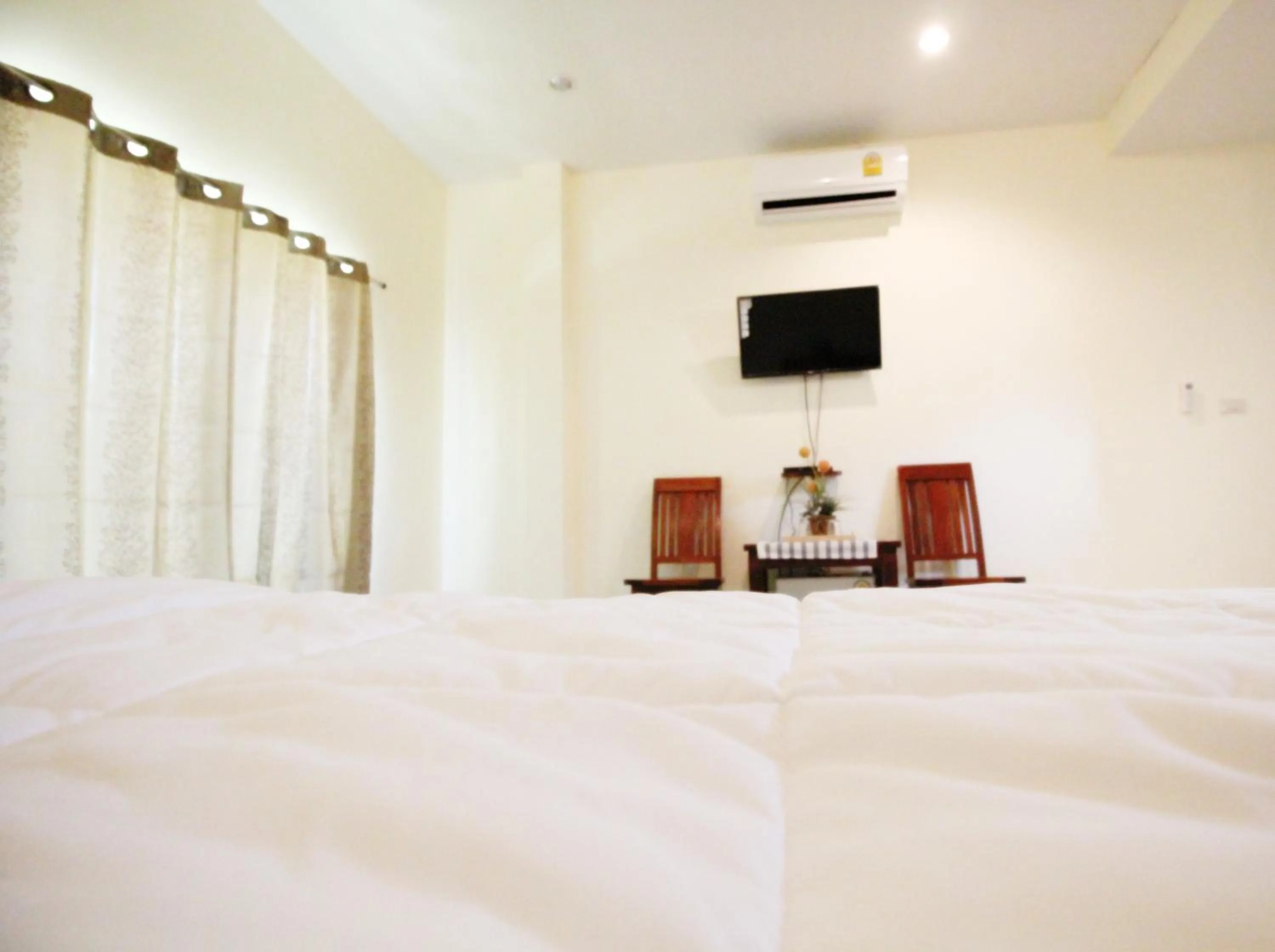 Bed in On Green Resort