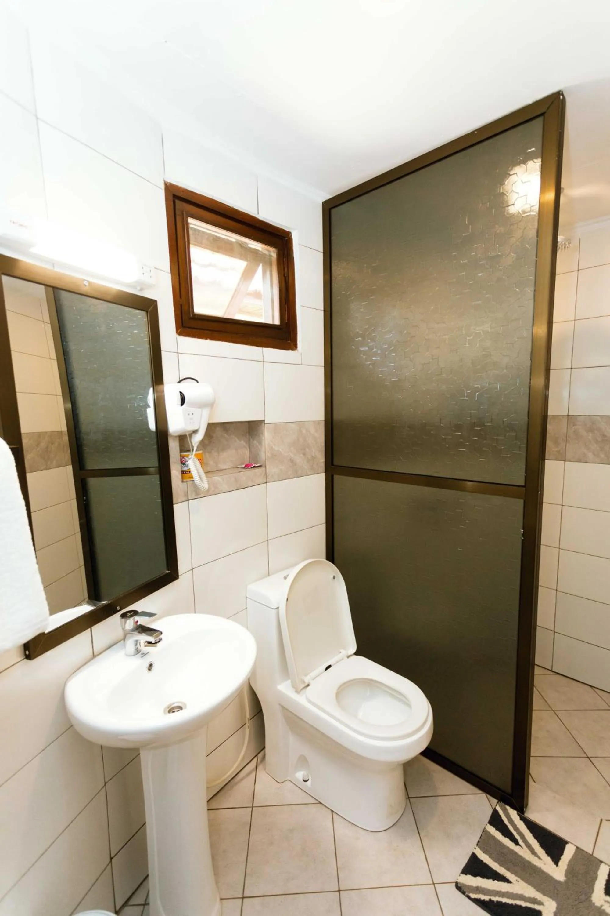 Toilet in Keys Hotel