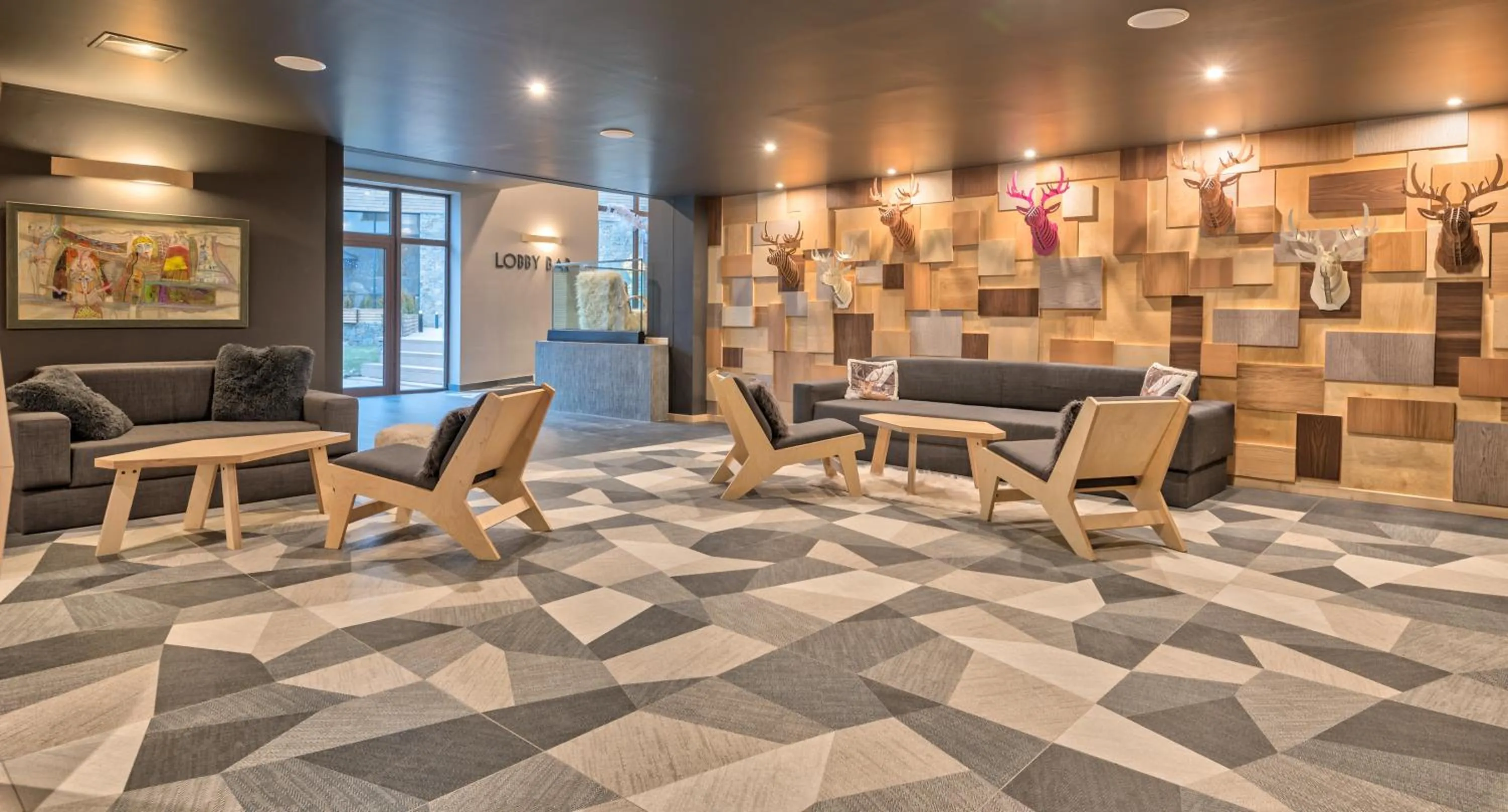 Communal lounge/ TV room in Hotel Arte SPA & Park