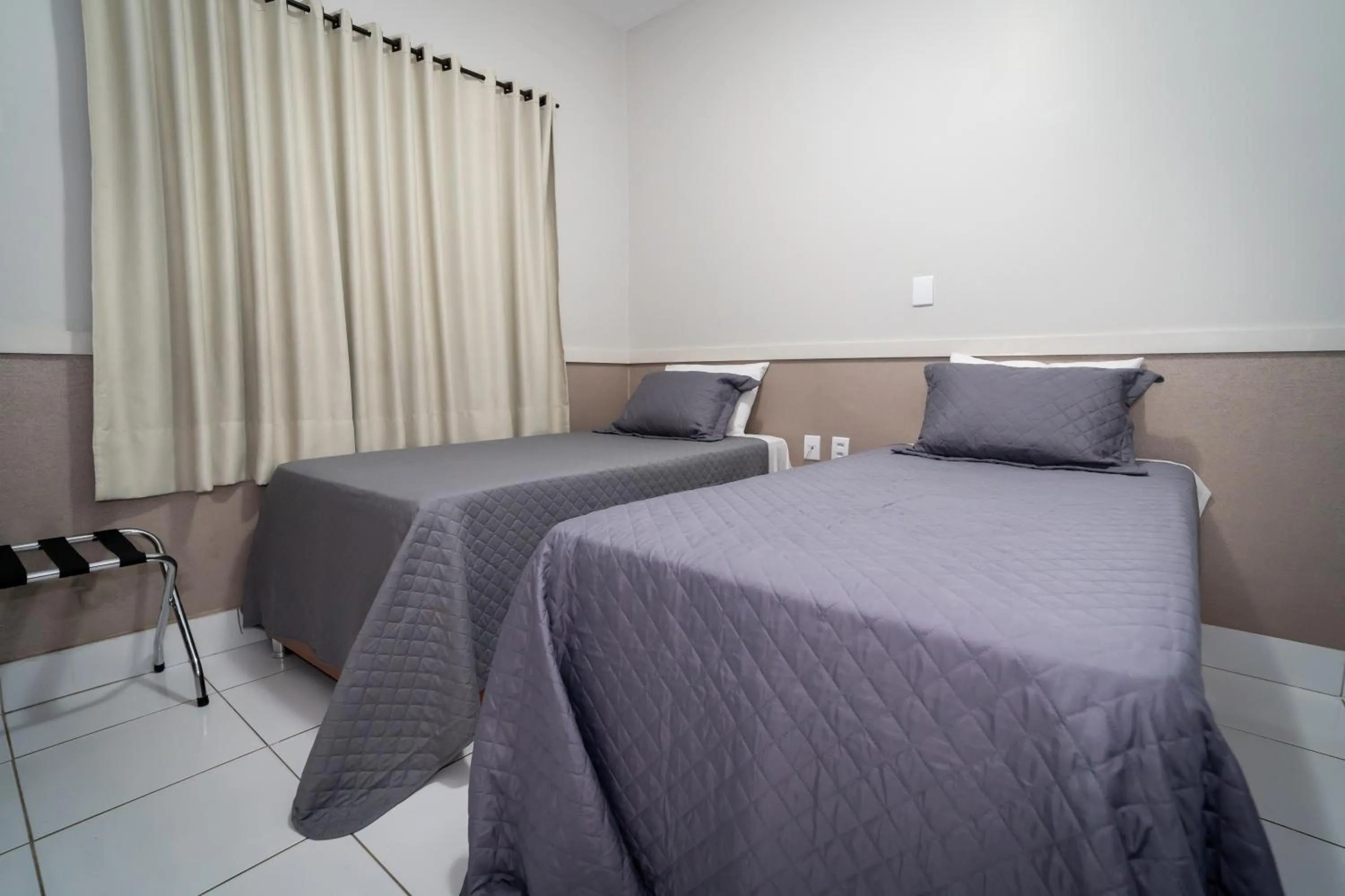 Bed in Bandeirantes Hotel