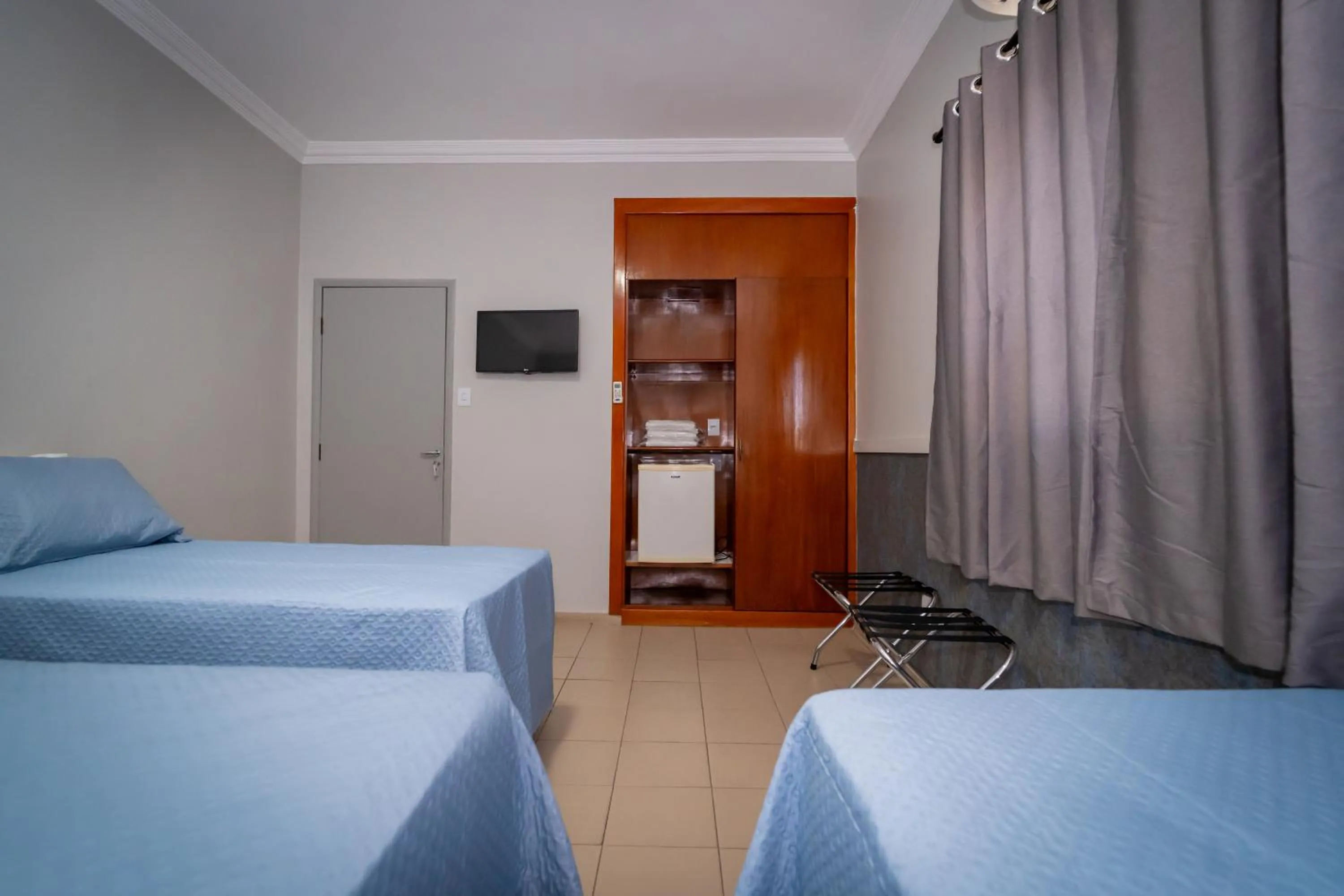 Bed in Bandeirantes Hotel