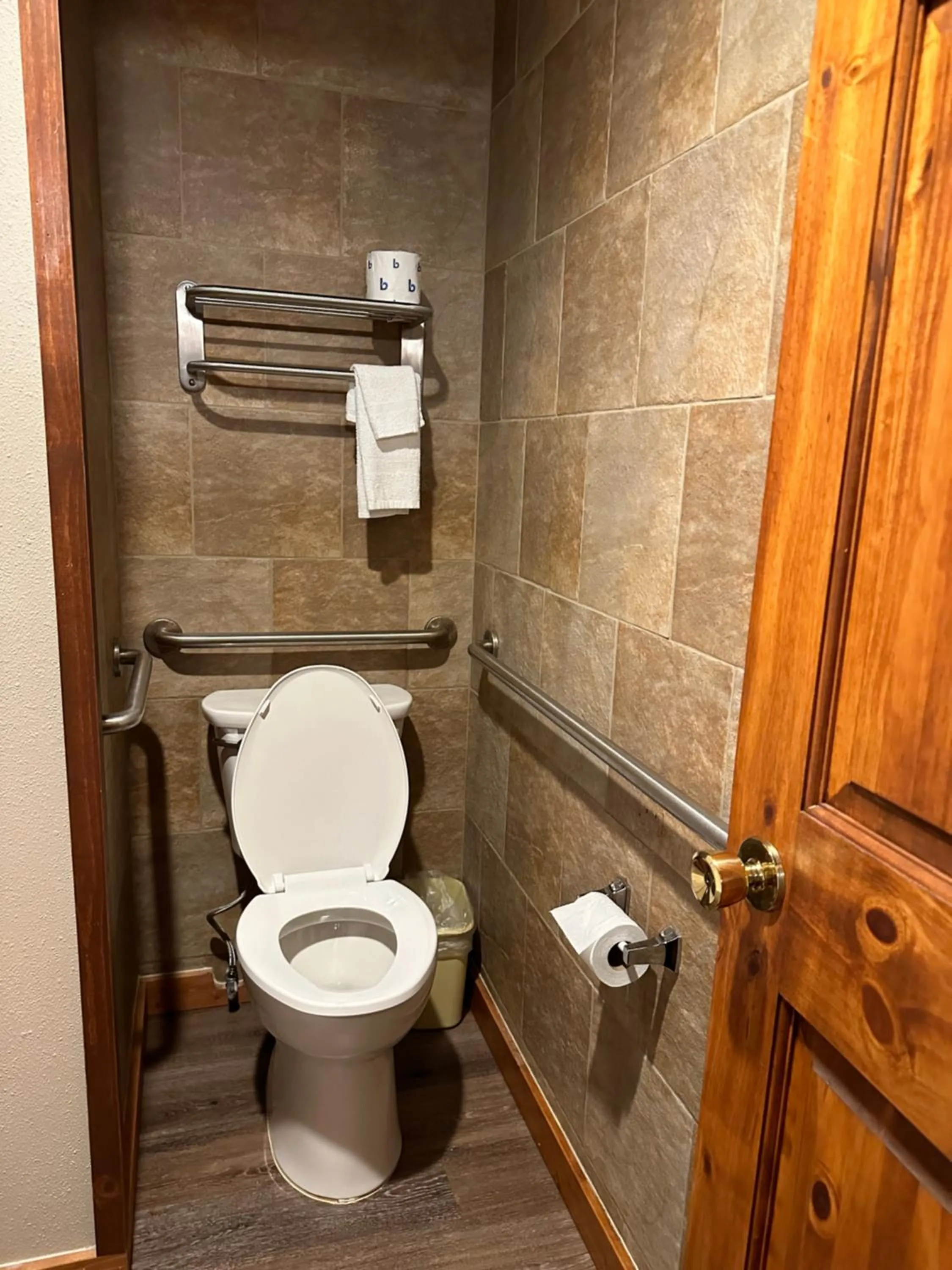 Toilet in Timber Lodge Inn