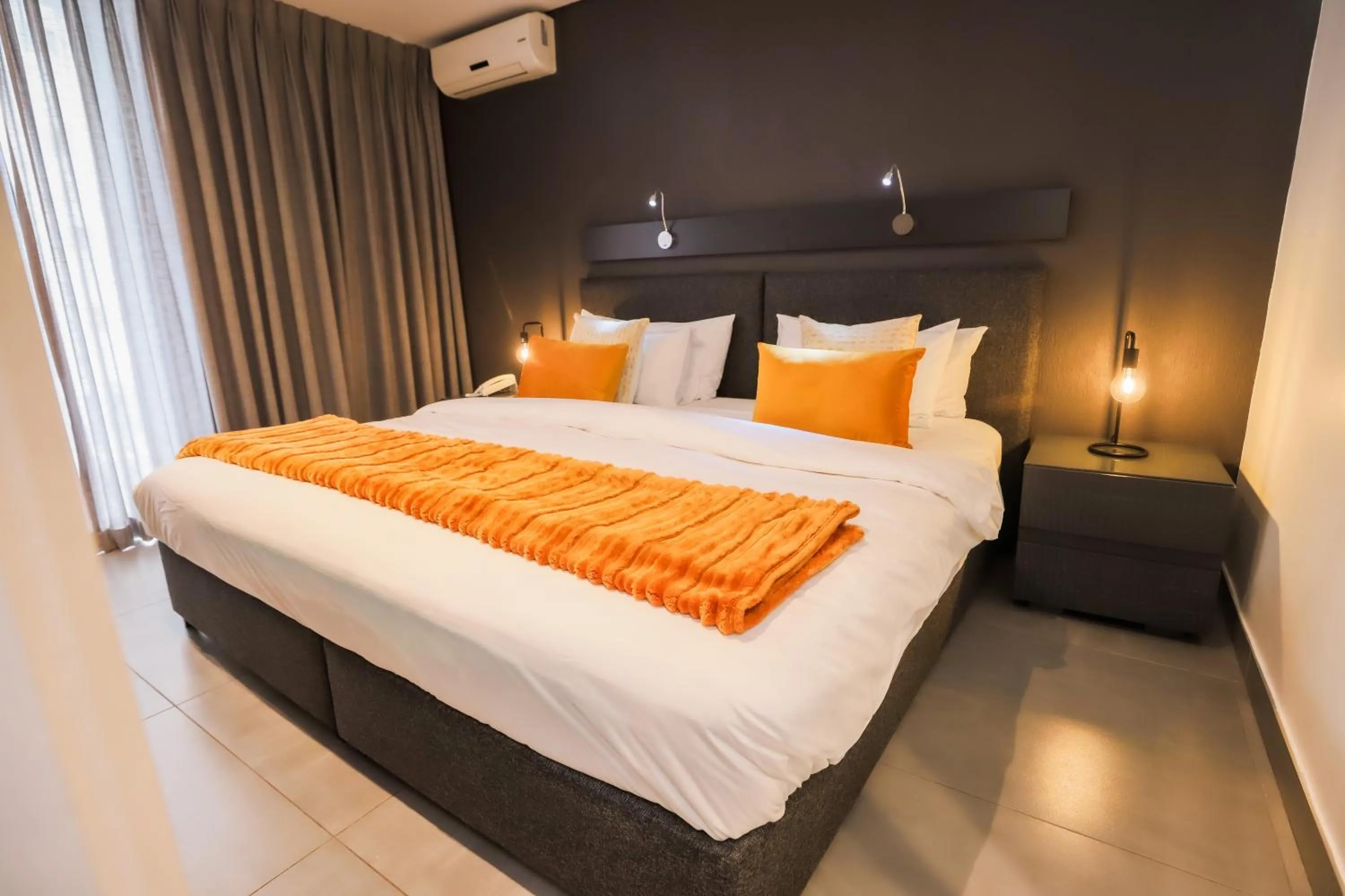 Bed in Atlantic Affair Boutique Hotel