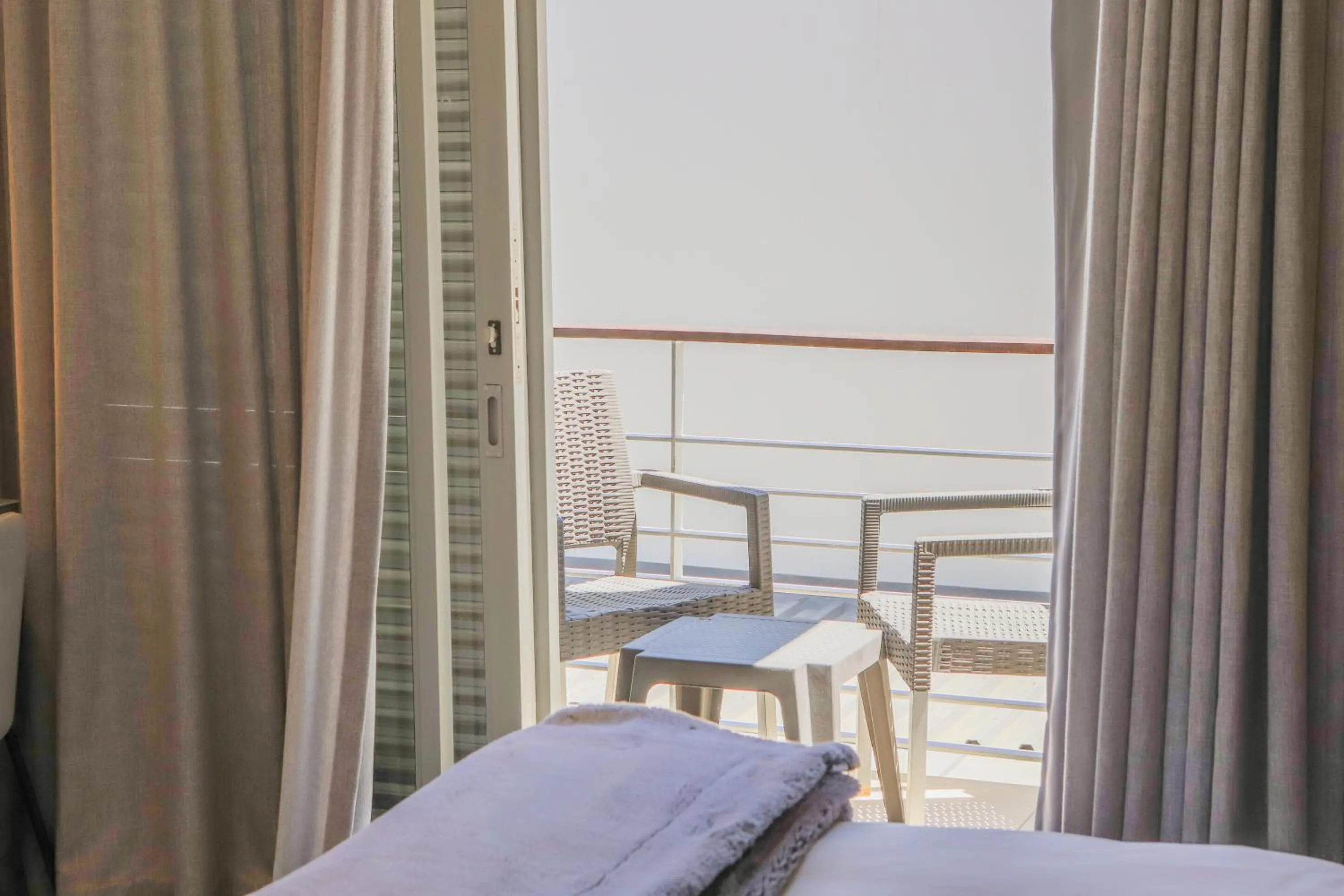 Bed in Atlantic Affair Boutique Hotel