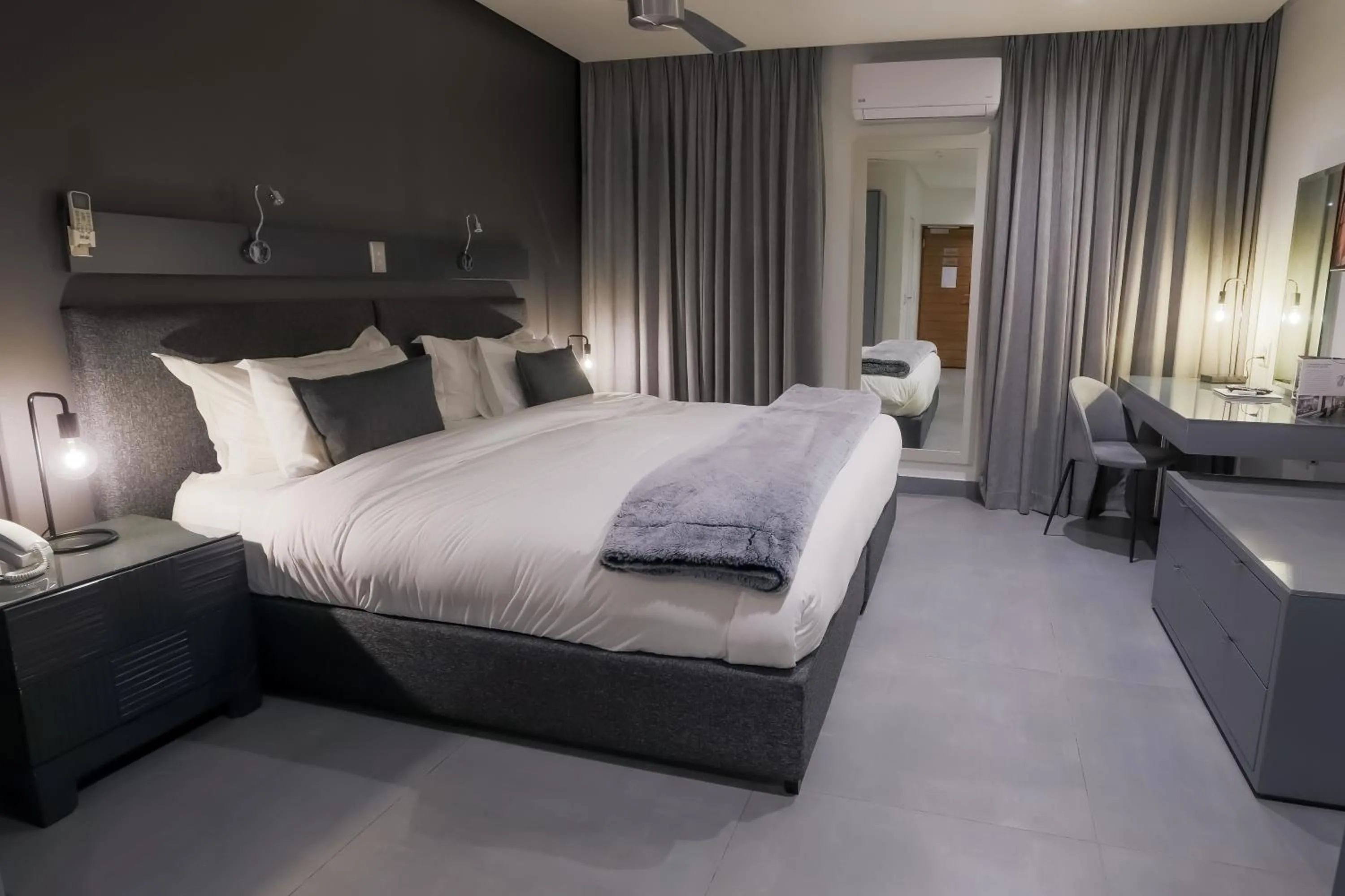 Bed in Atlantic Affair Boutique Hotel