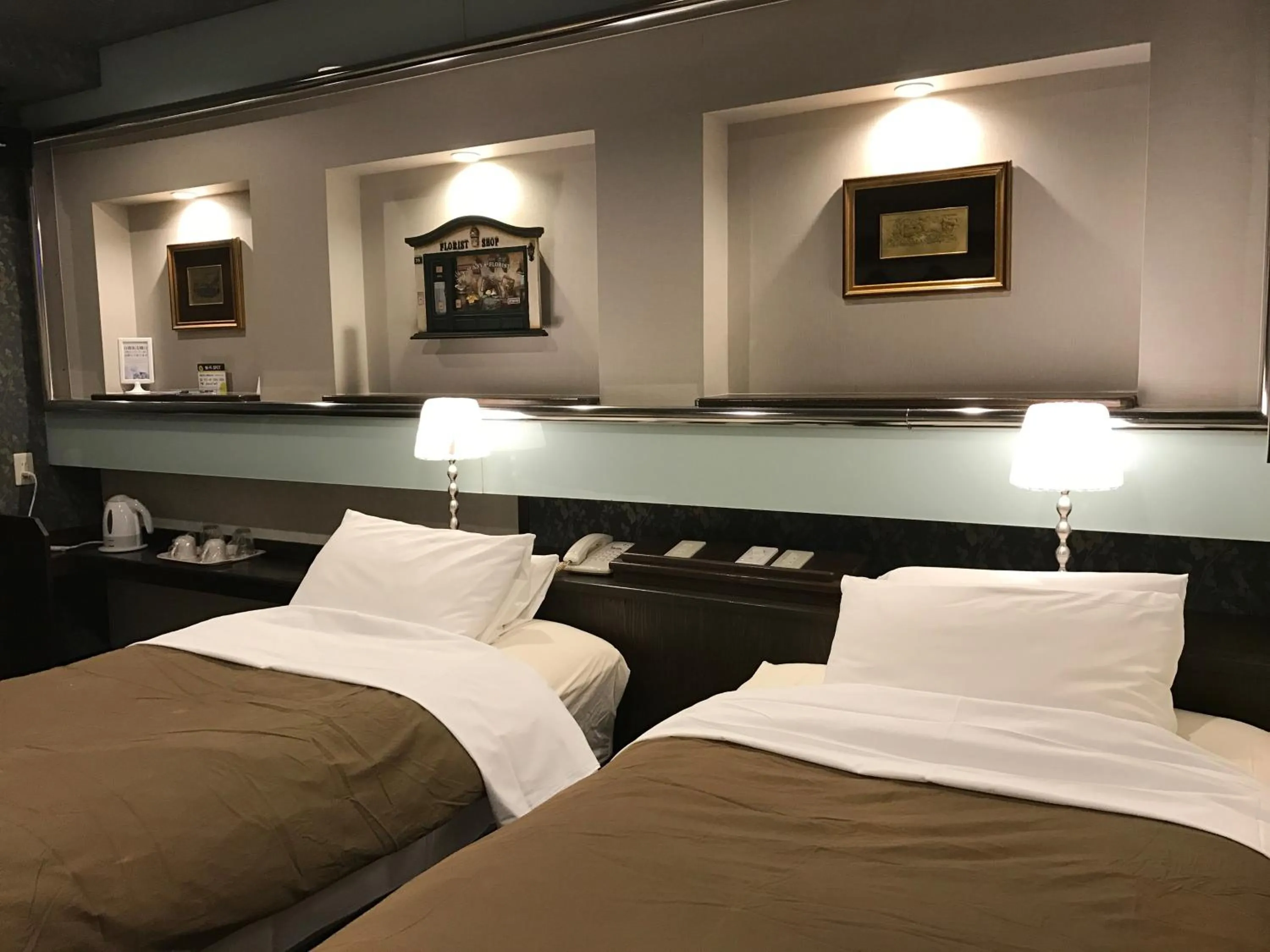 Bed in ビジネスインホテルプラザ21大阪京橋