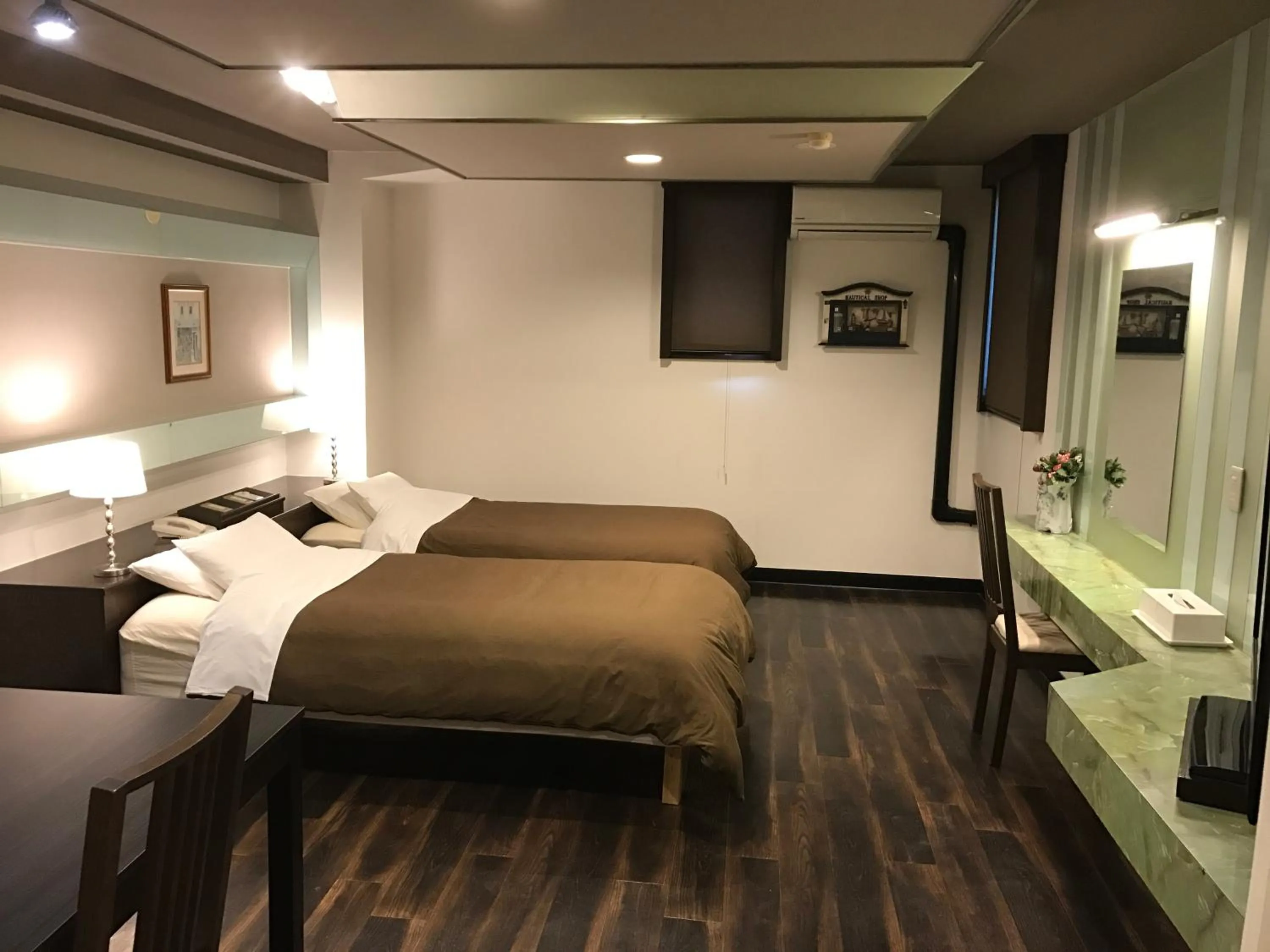 Bed in ビジネスインホテルプラザ21大阪京橋