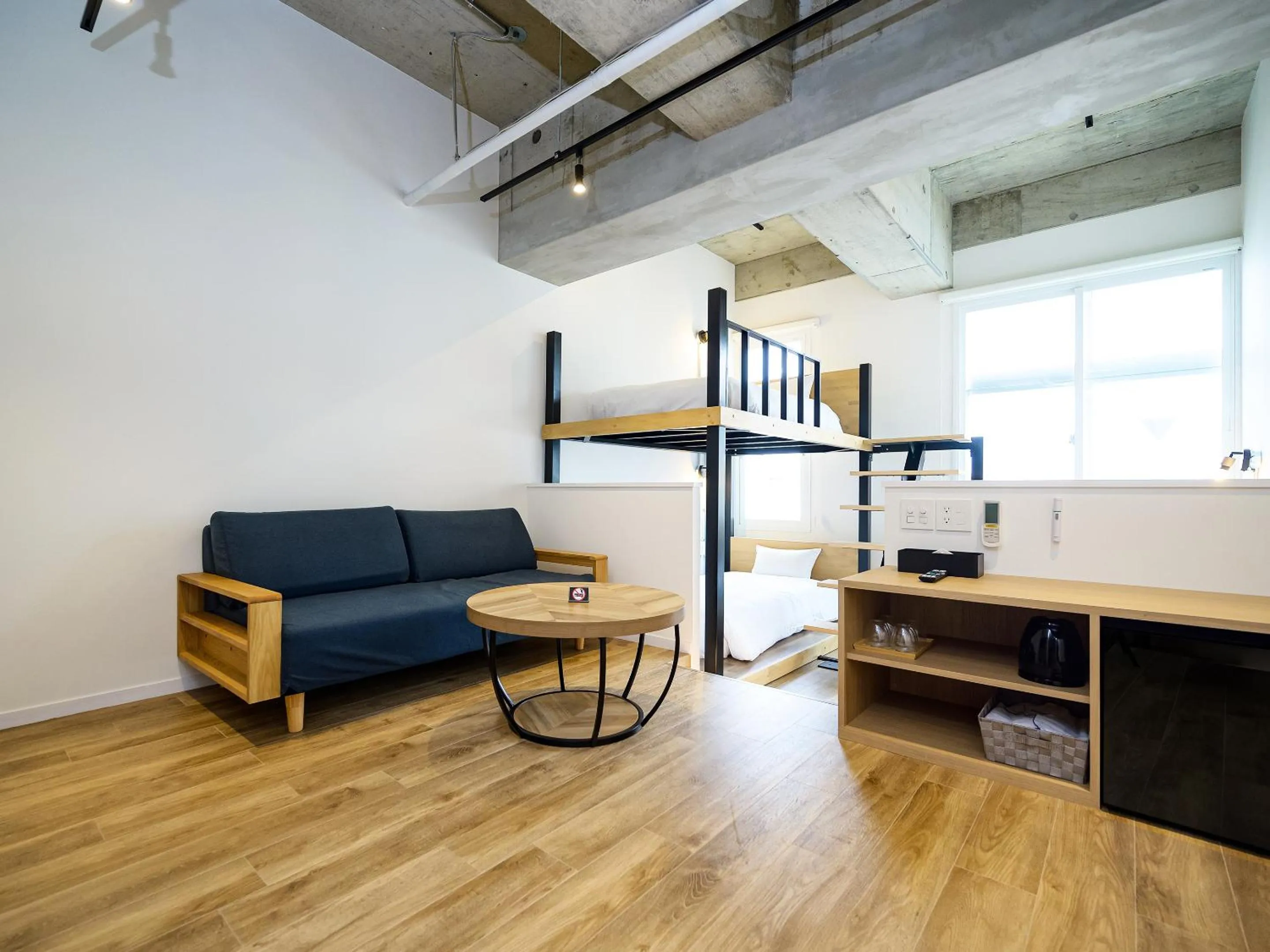 Photo of the whole room, Bed in HOTEL THE CUBE Naha Kokusai Street