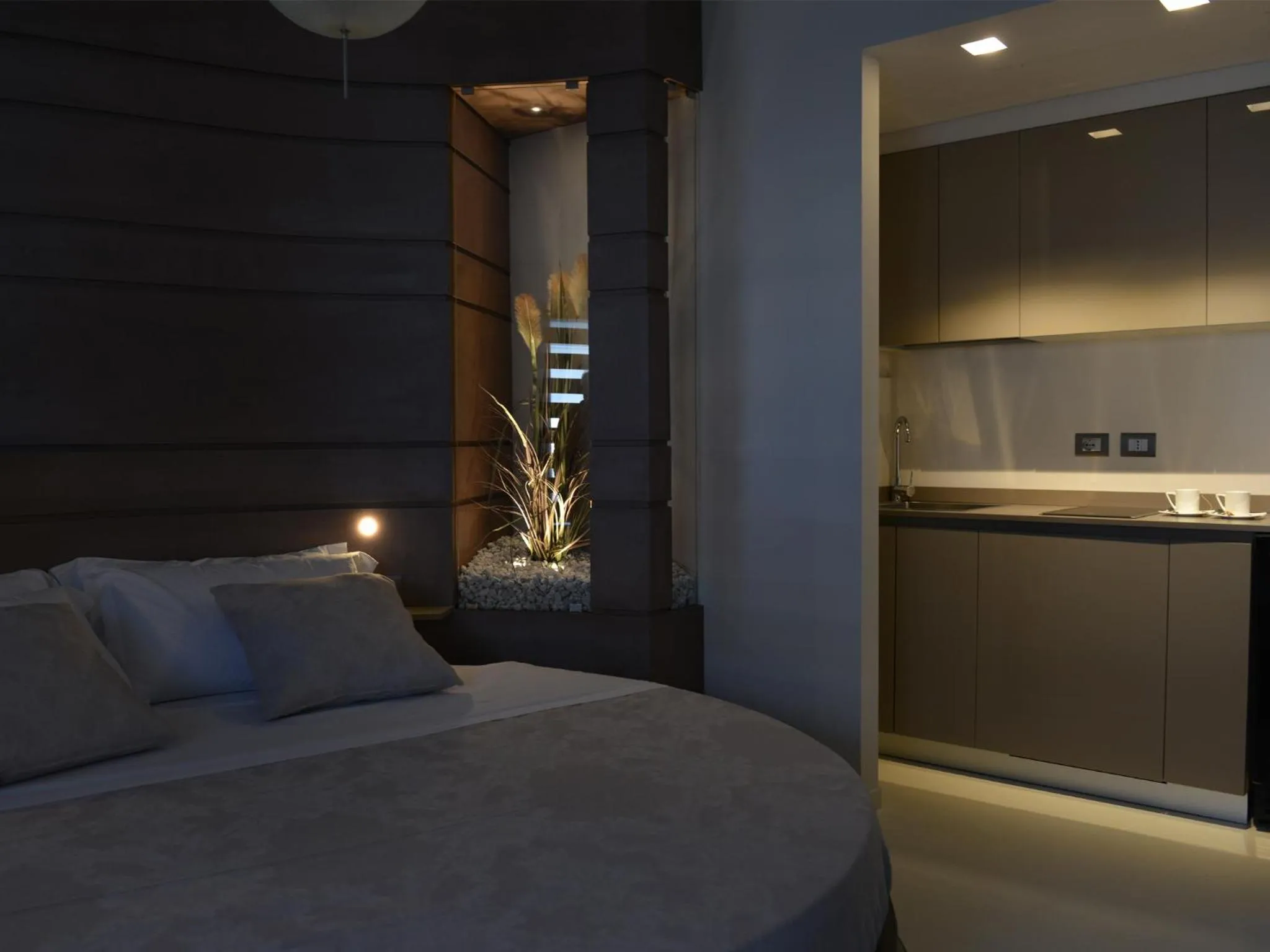 Kitchen or kitchenette, Bed in La Residenza del Monaco bianco