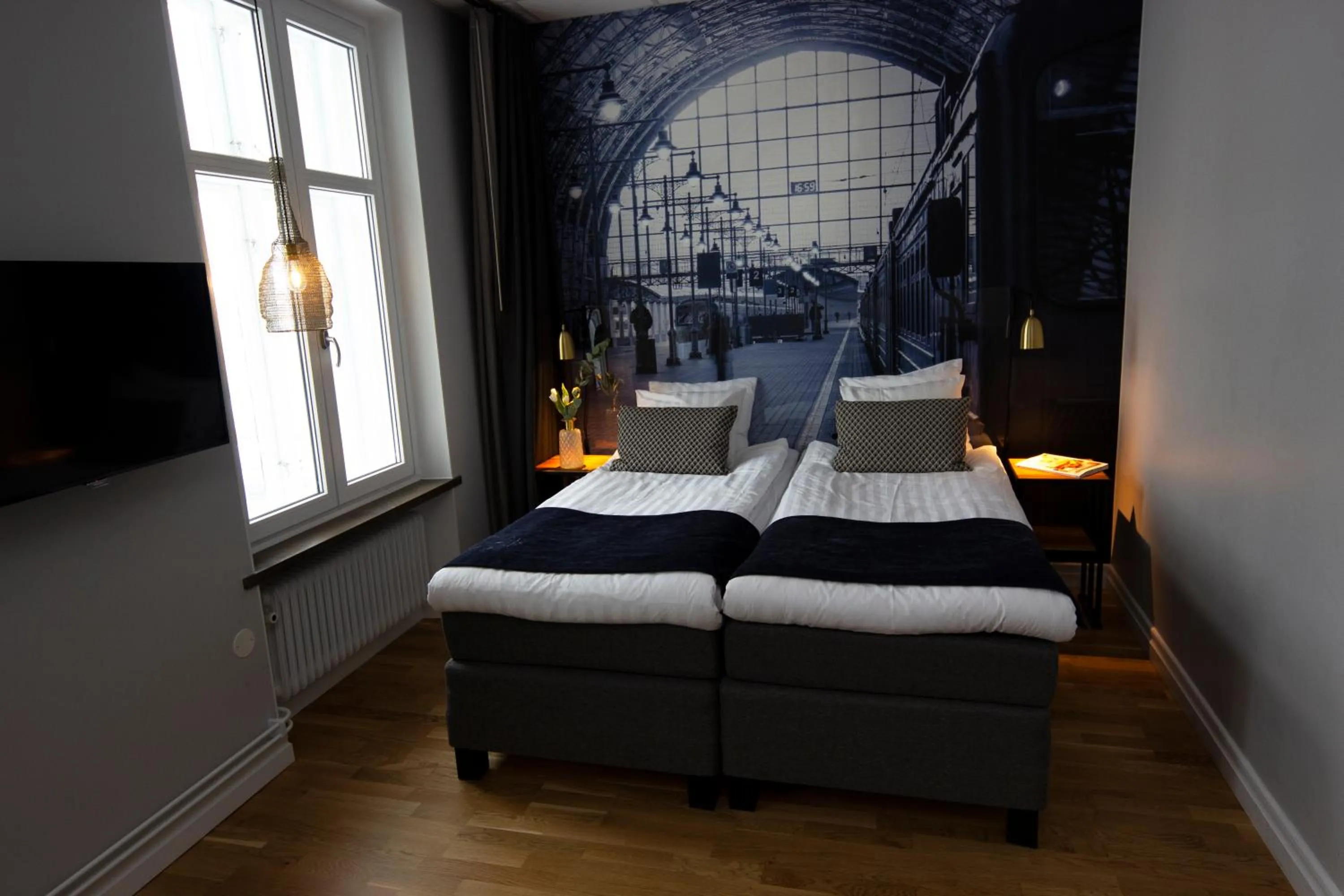 Bed in Livin Station Hotel