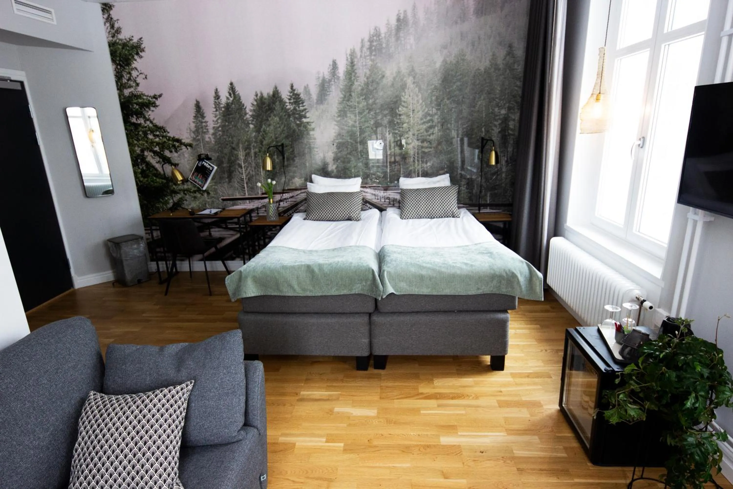 Bed in Livin Station Hotel