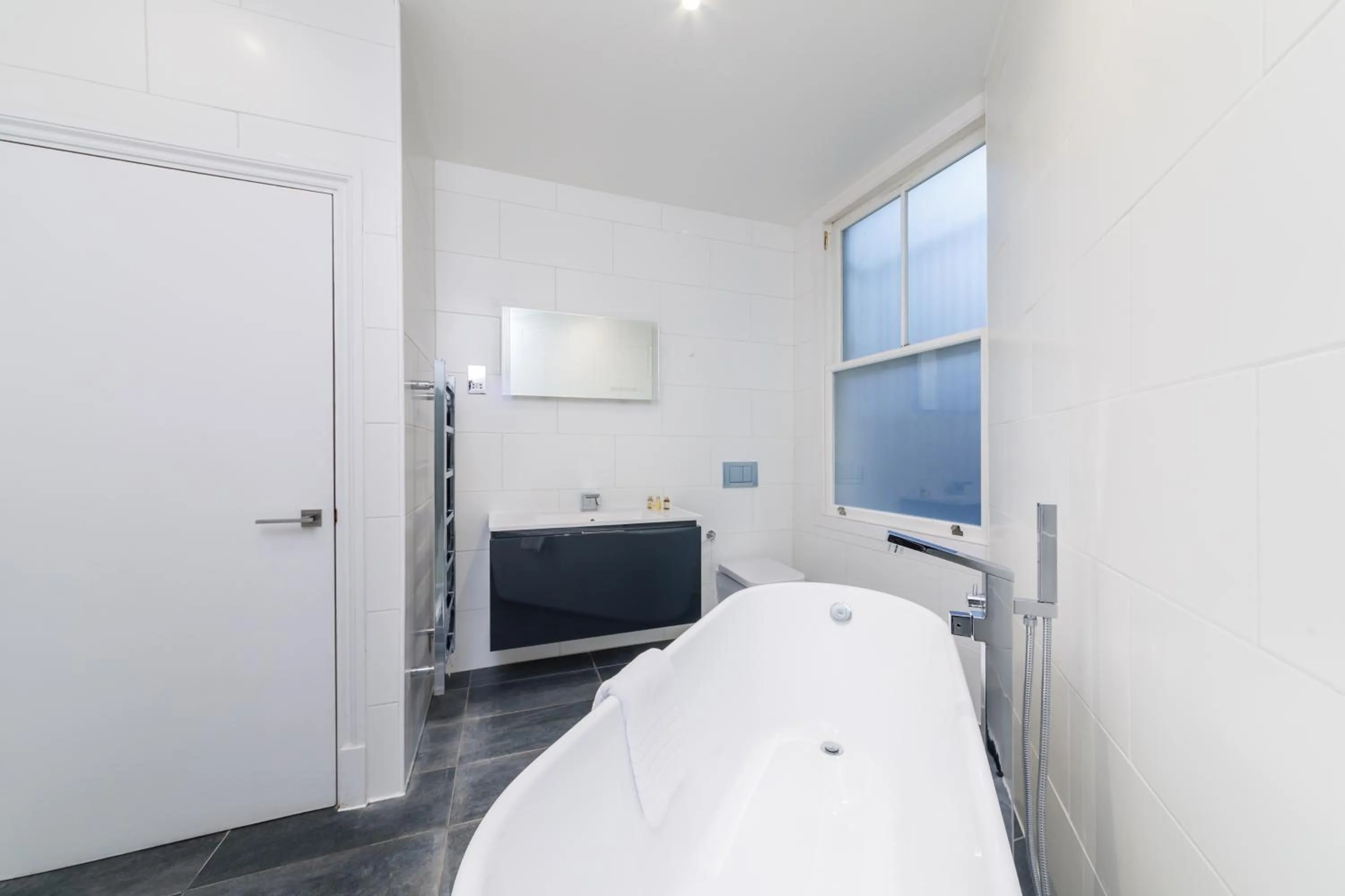 Bed in Garrick Mansions by Aeria Apartments