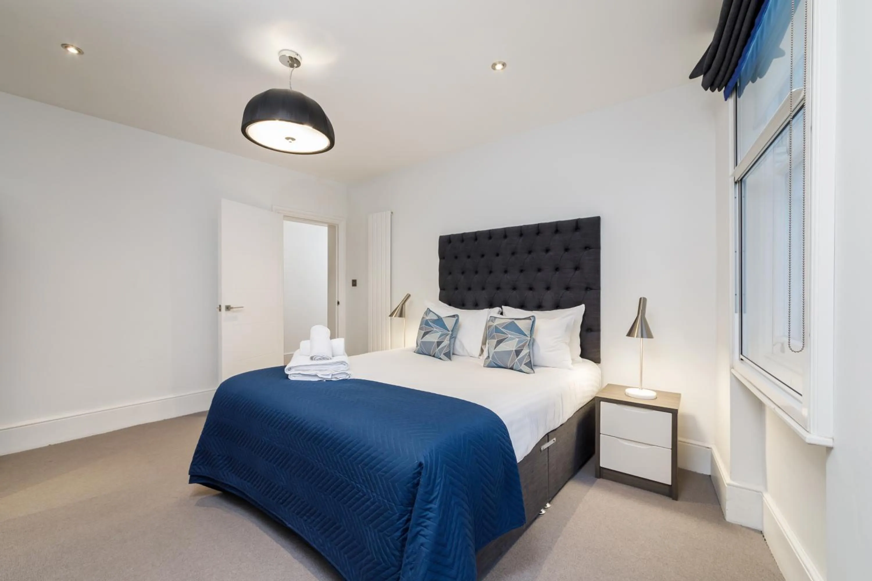 Bed in Garrick Mansions by Aeria Apartments