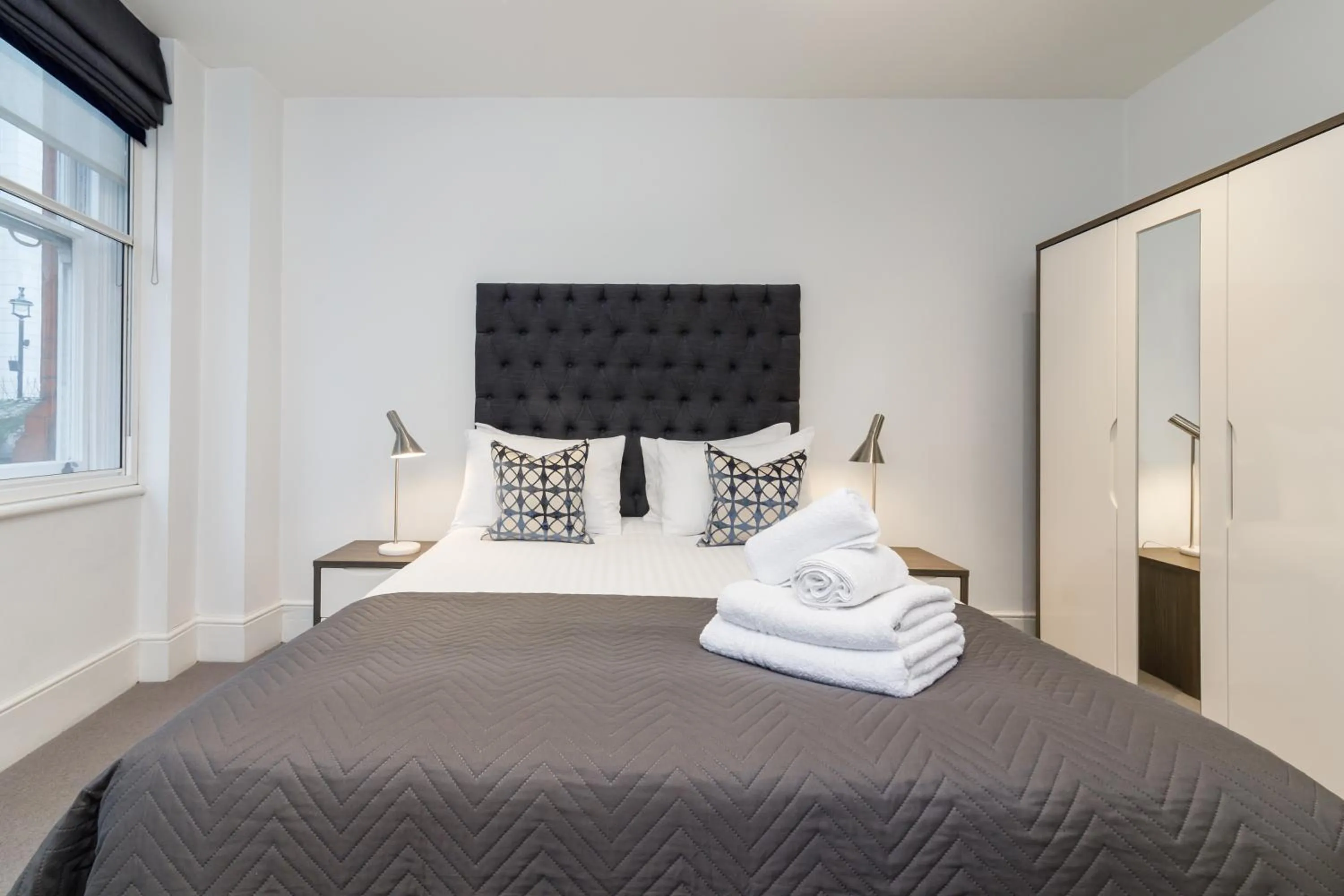 Bed in Garrick Mansions by Aeria Apartments