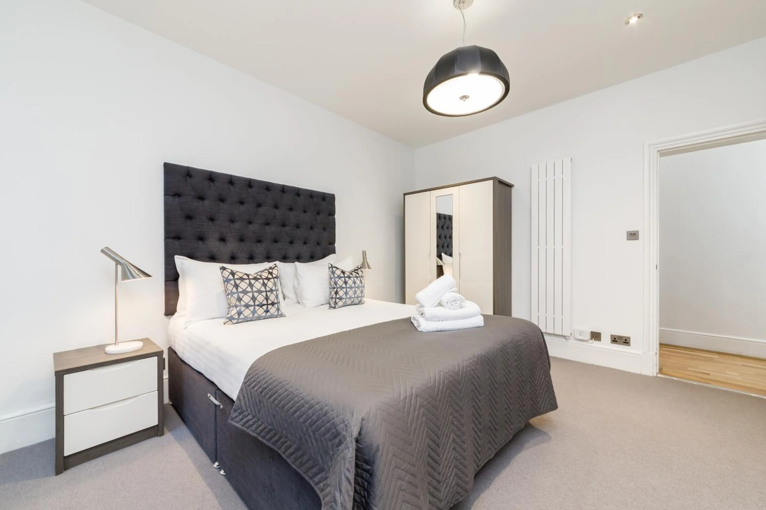 Bed in Garrick Mansions by Aeria Apartments
