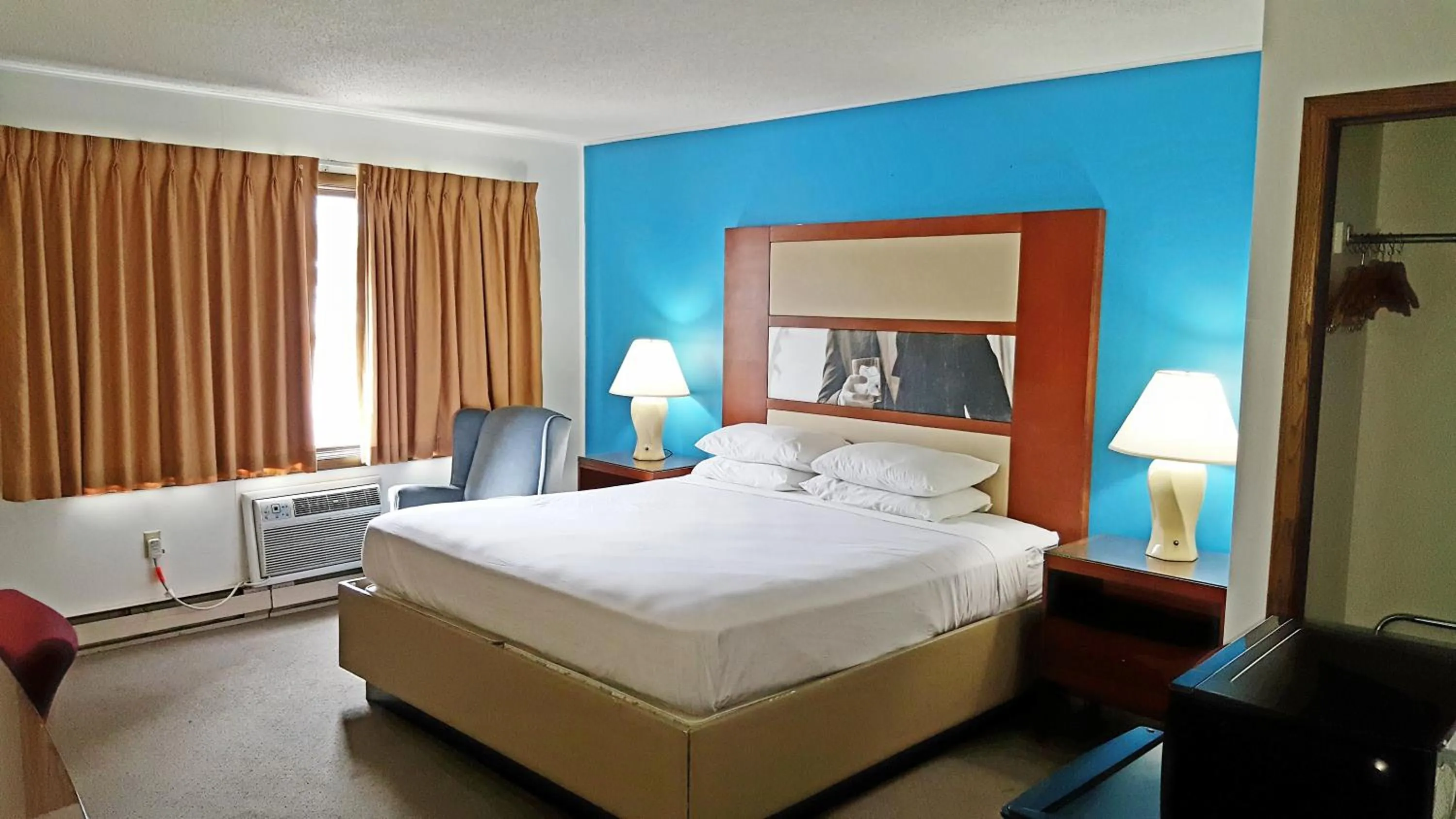 Room Photo in Country Hearth Inn-Iron Mountain