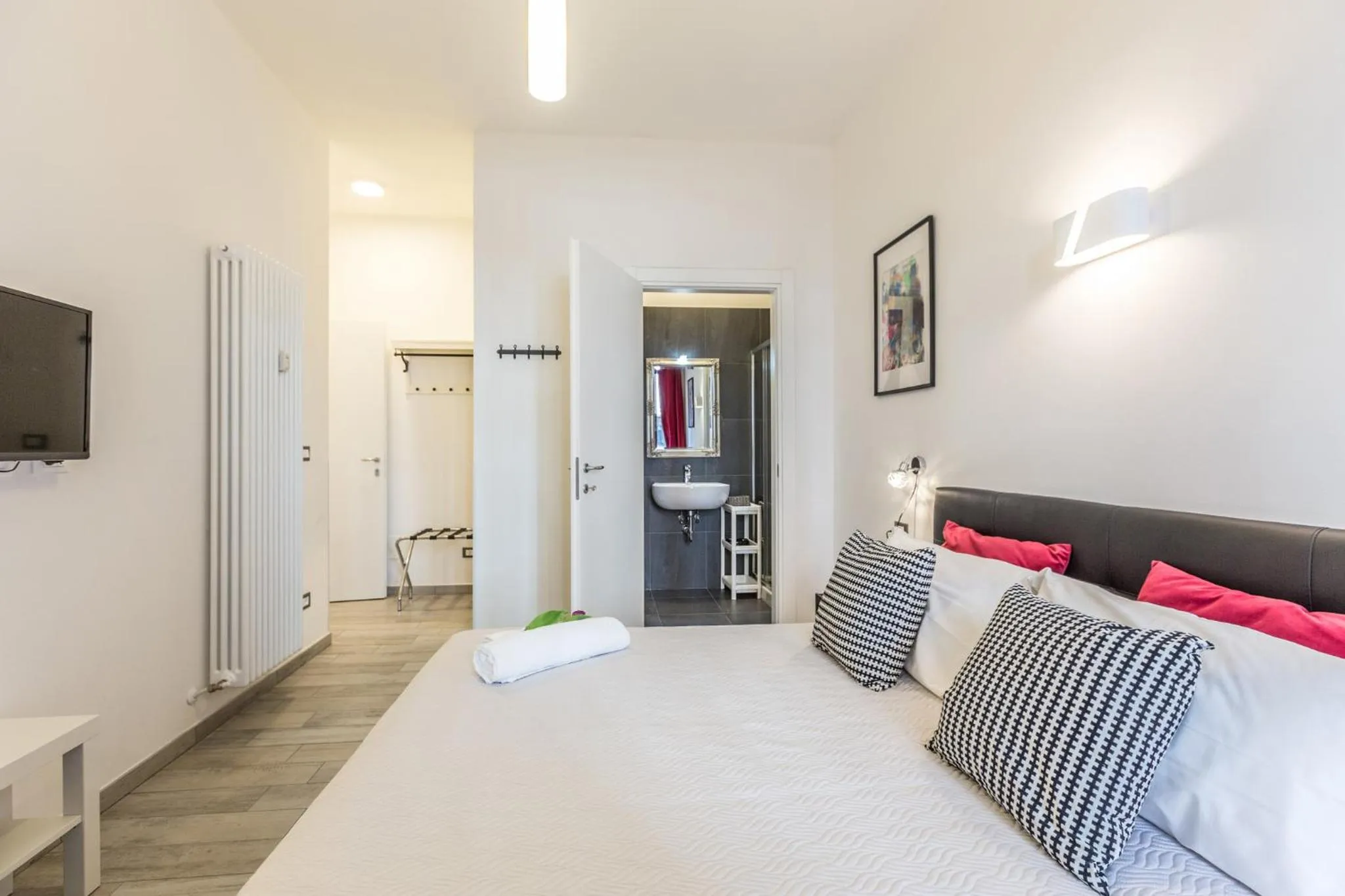 Bed in Central City Rooms