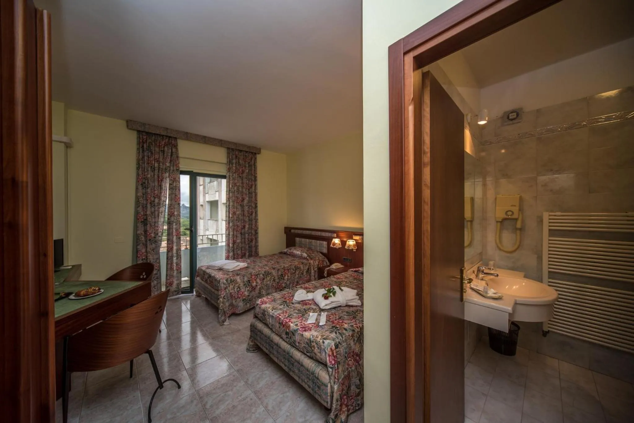 Bed in New Petit Hotel