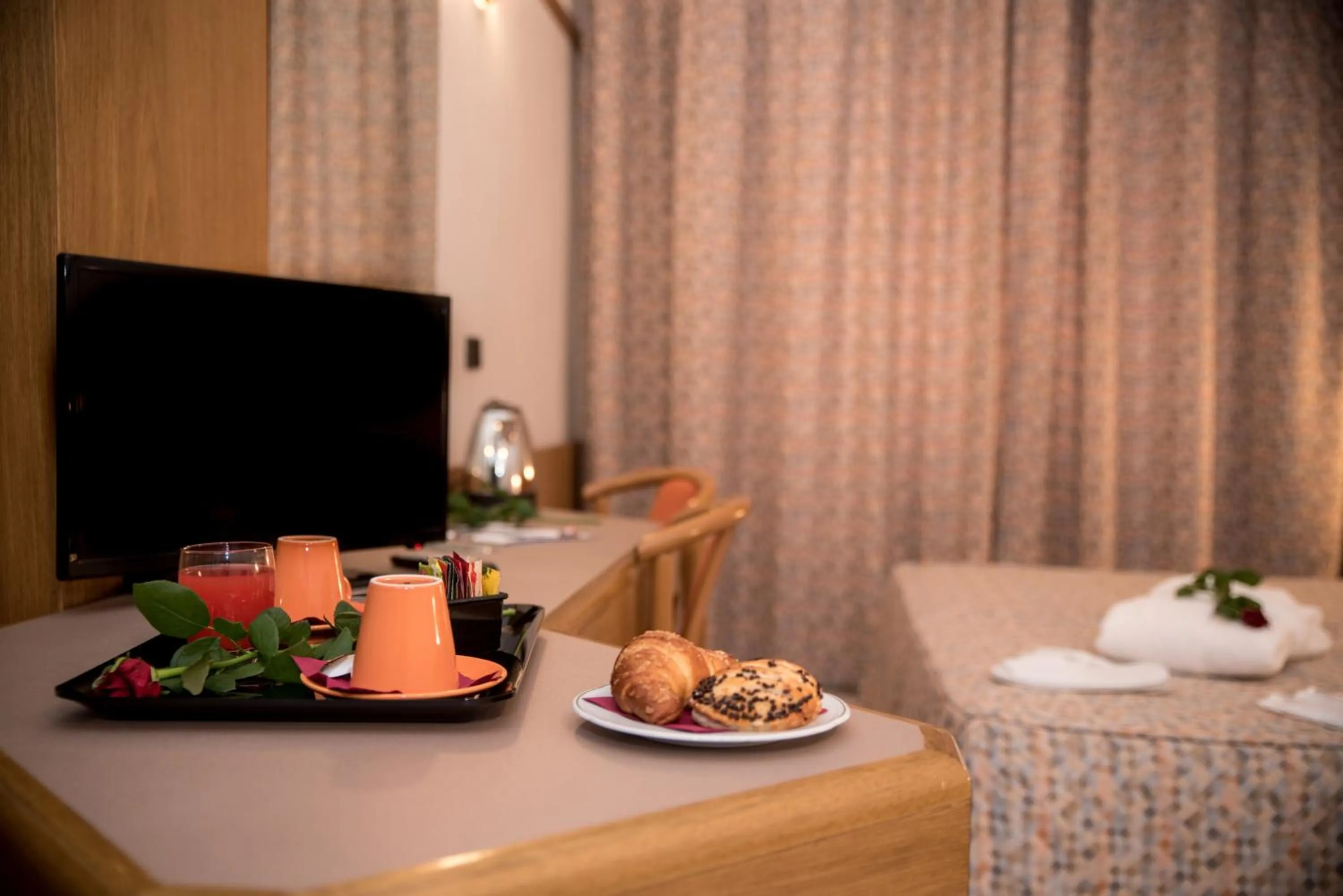 Bedroom in New Petit Hotel