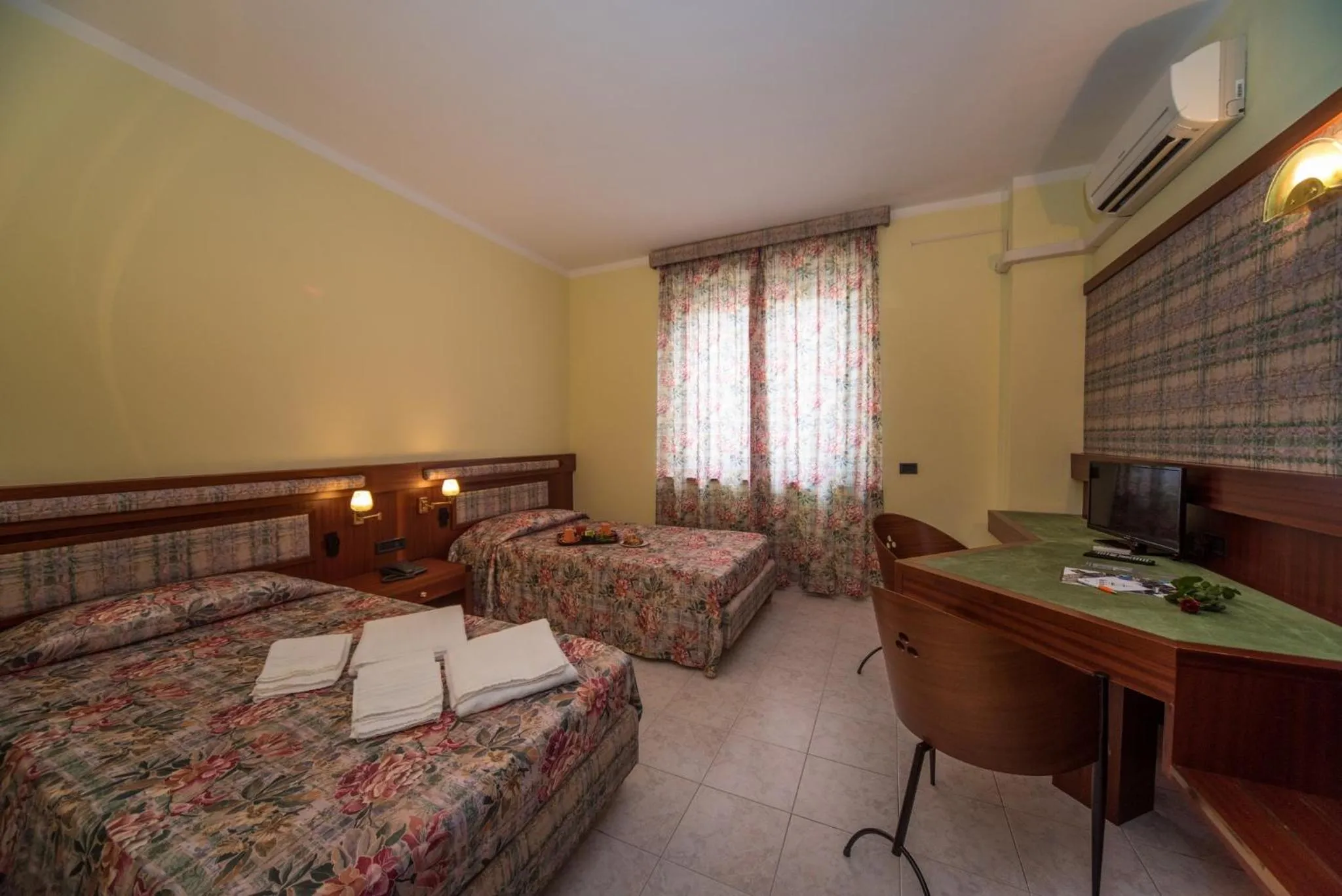 Bed in New Petit Hotel