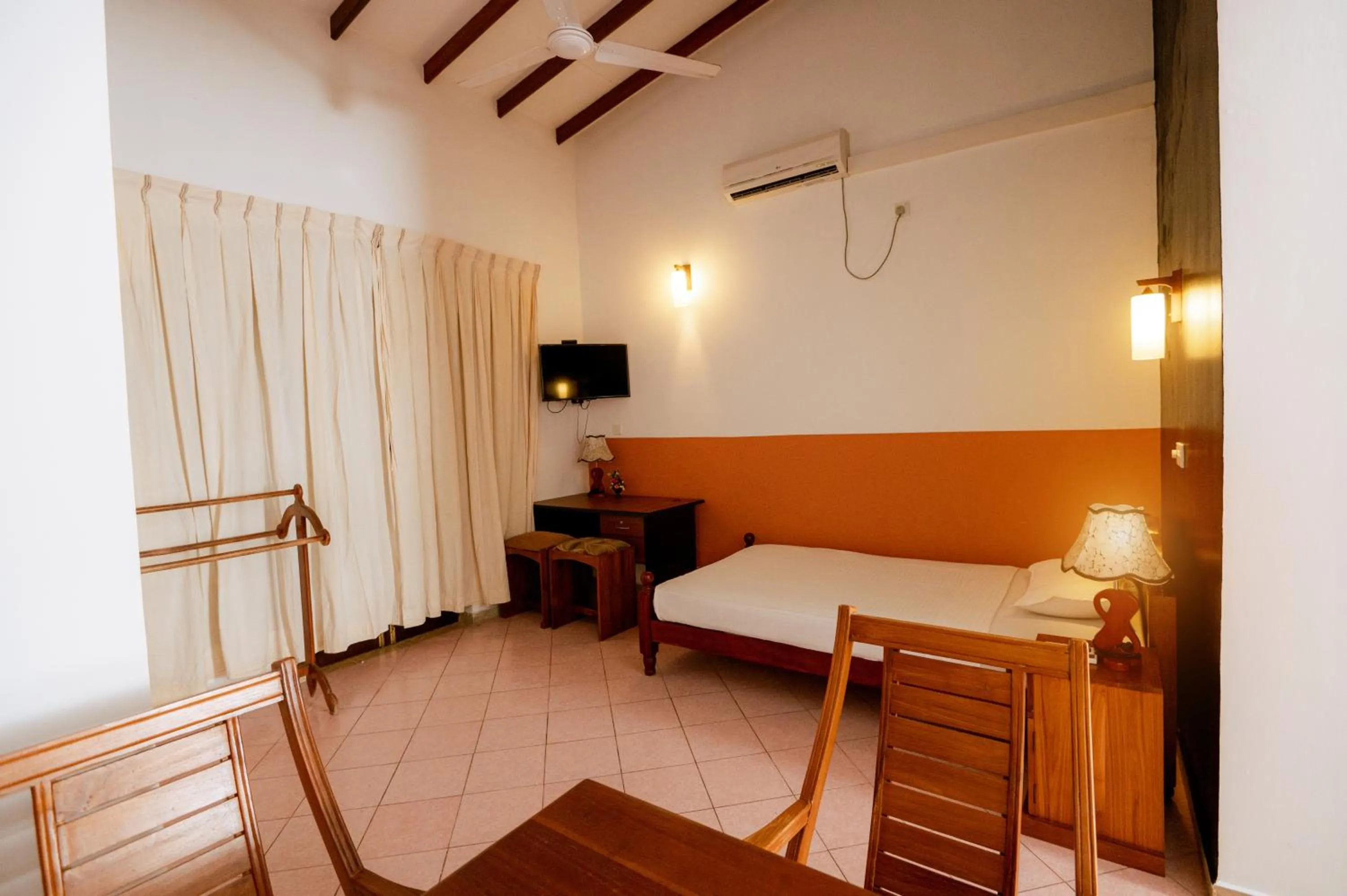 Bedroom, Bed in Prince Beach Hotel Bentota