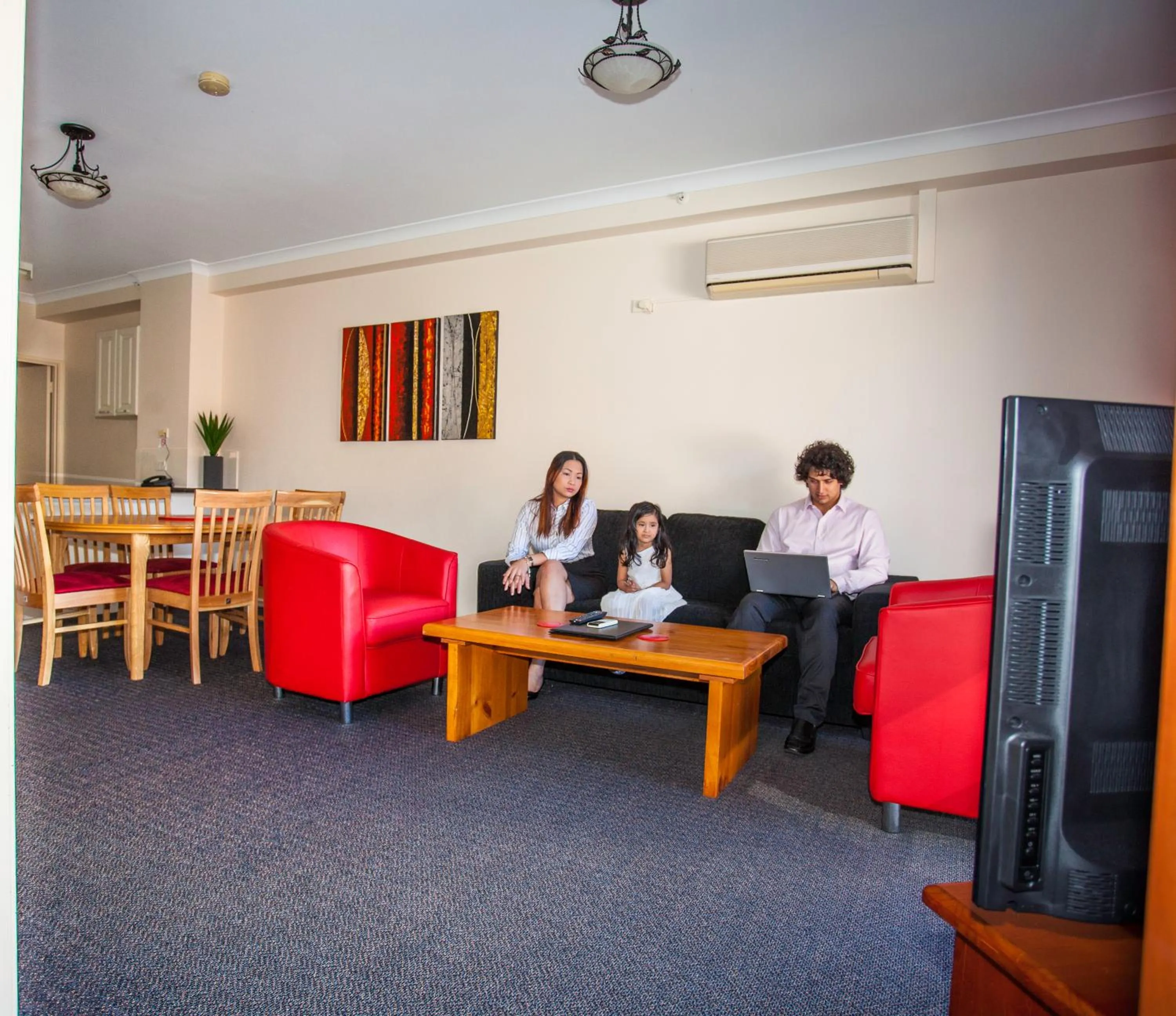 Living room, Family in Starwest Apartments Alderney On Hay