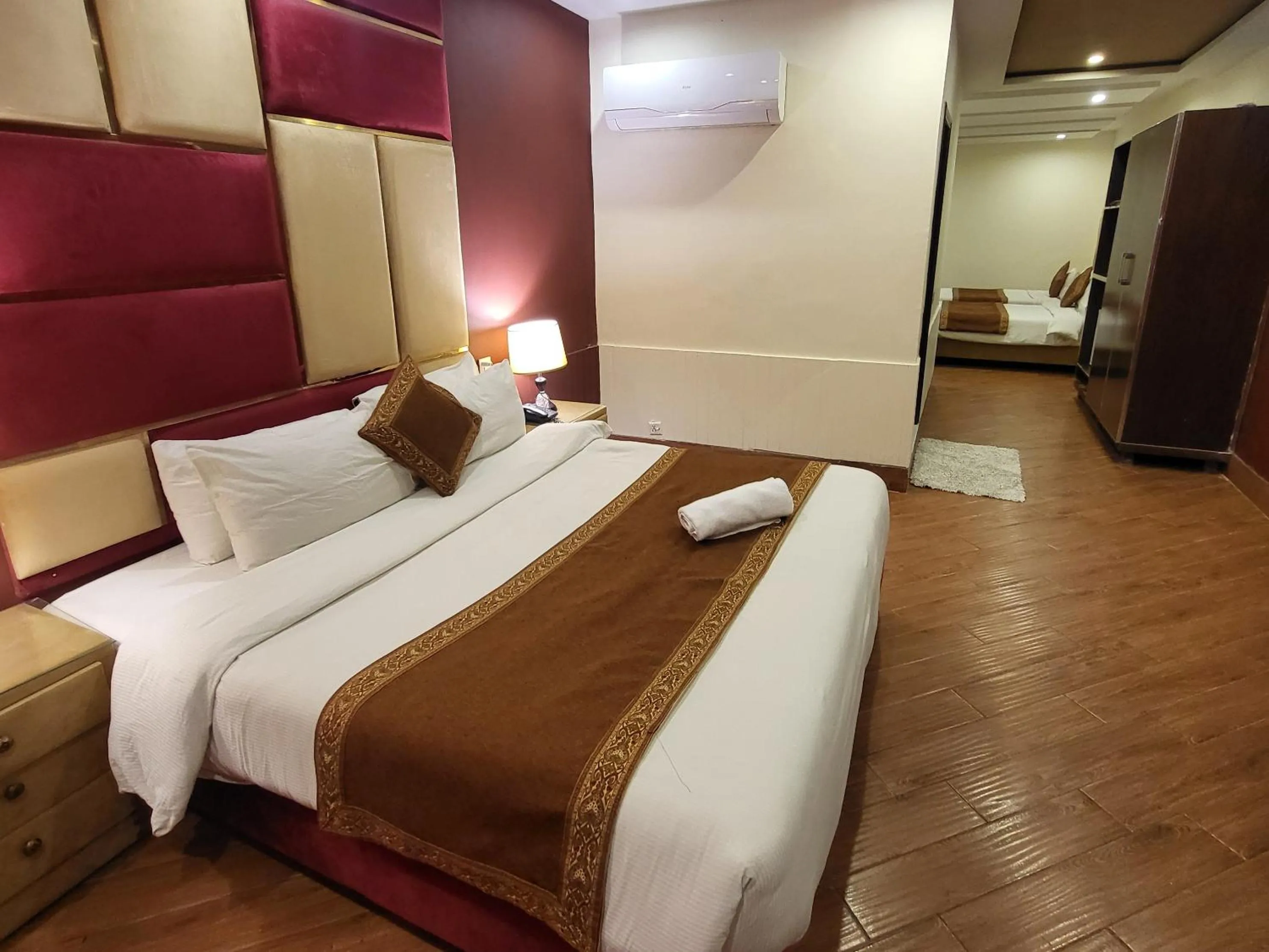 Bed in Grand Millennium Hotel