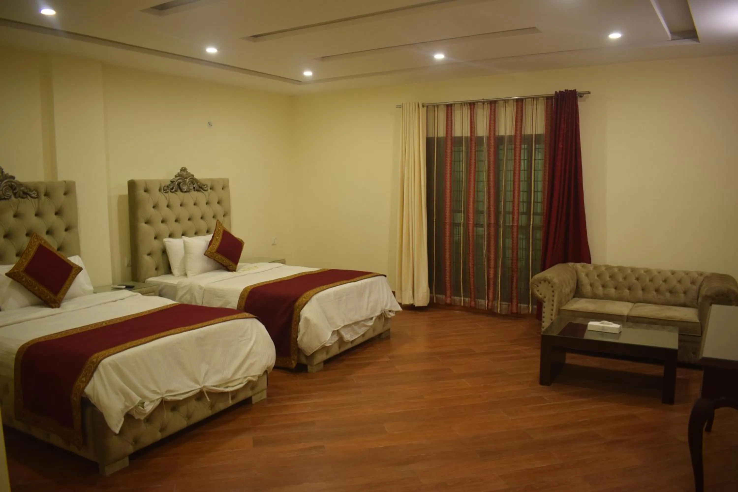 Bed in Grand Millennium Hotel