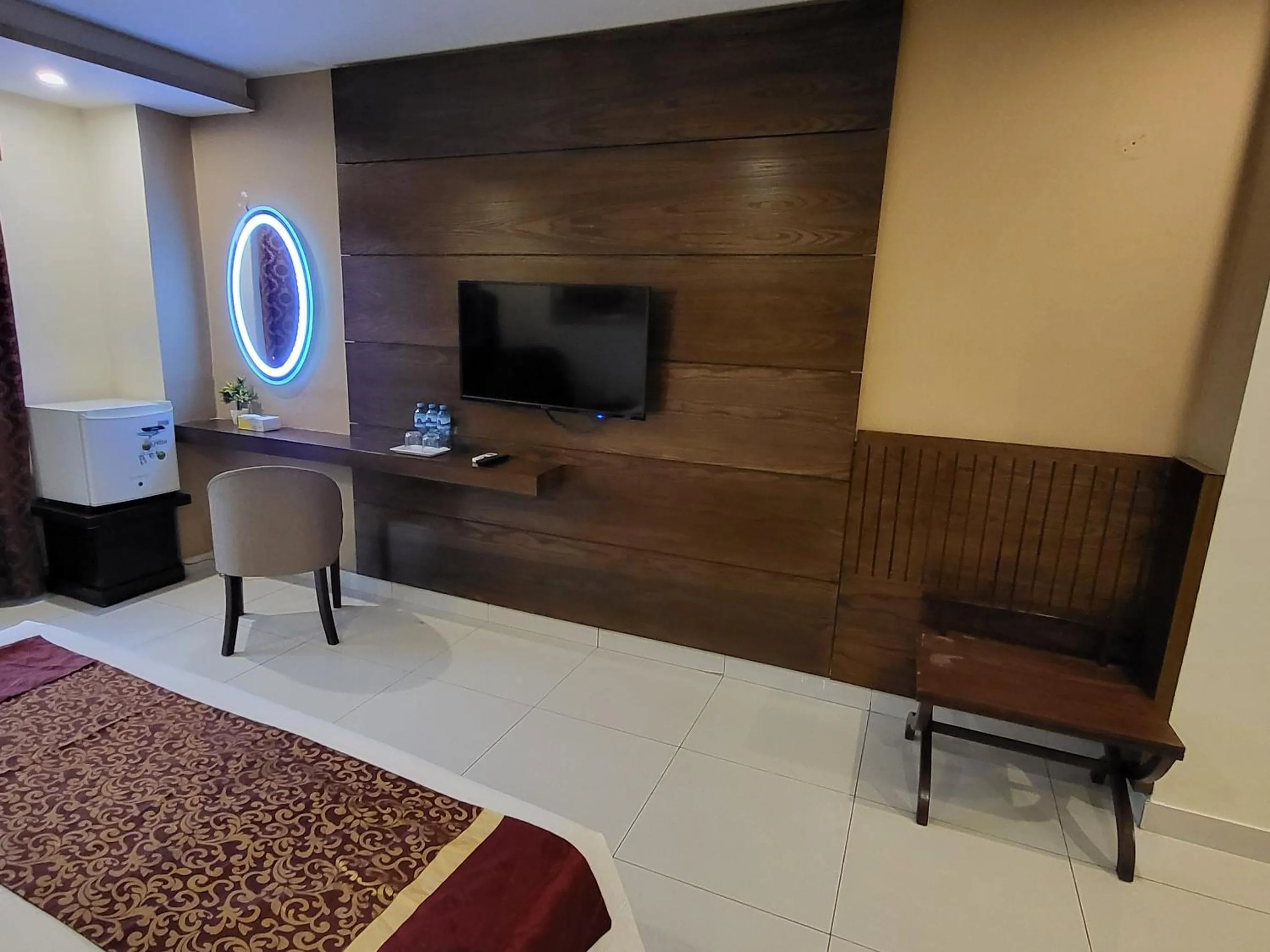 Communal lounge/ TV room in Grand Millennium Hotel