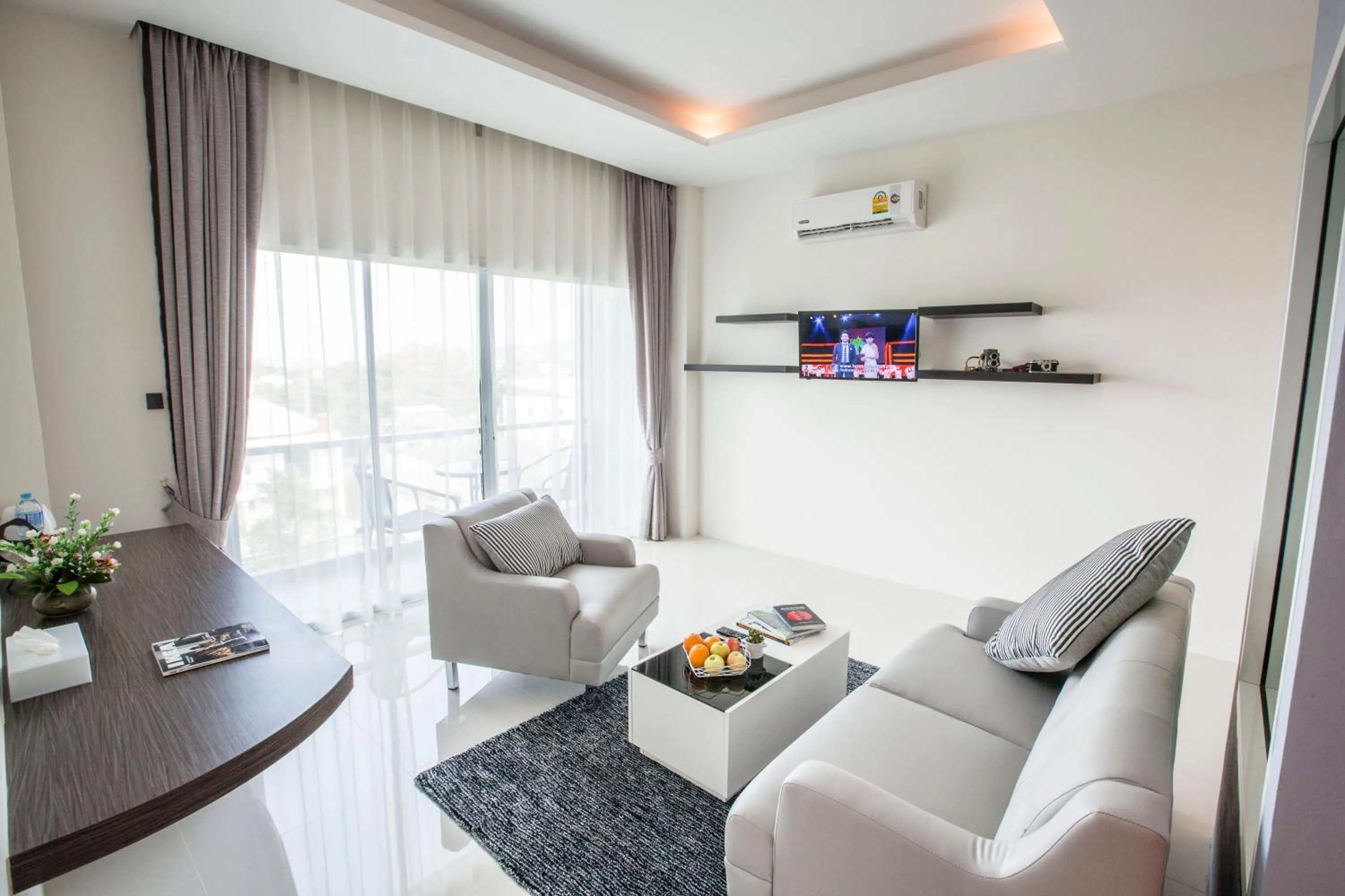 Living room in The Elysium Residence - SHA Extra Plus