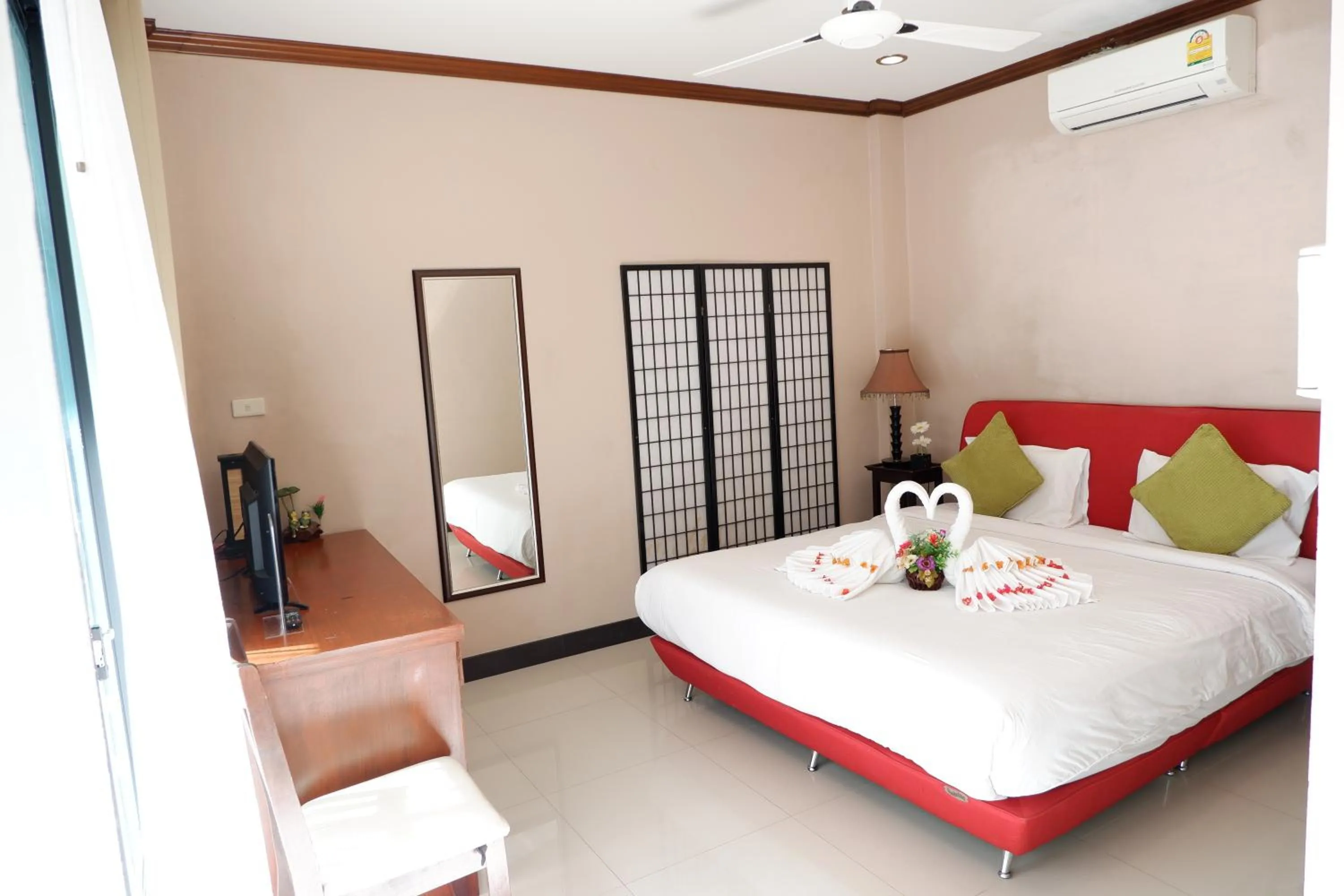 Bed in Kata Beachwalk Hotel and Bungalows