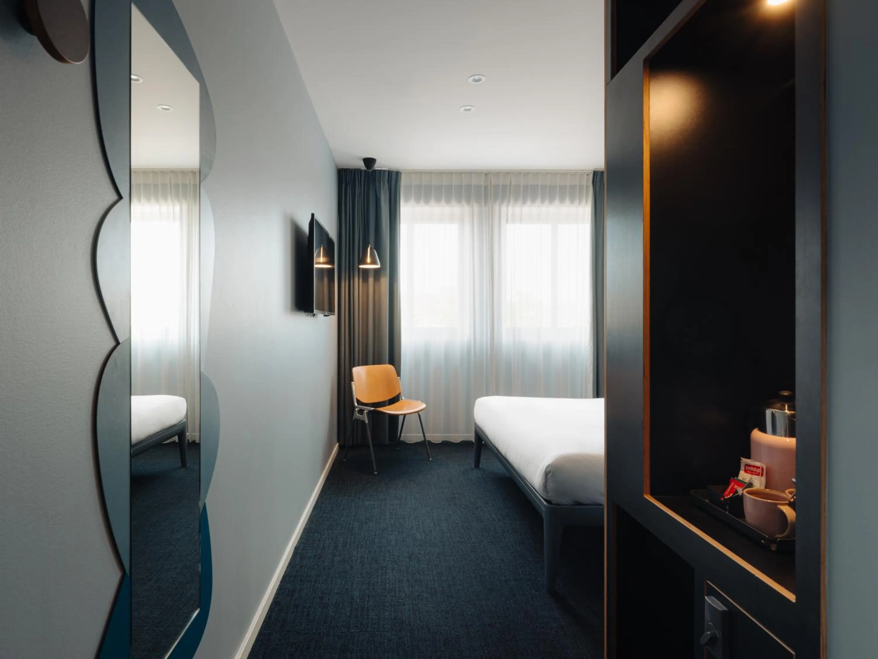 TV and multimedia, Bed in Conscious Hotel The Tire Station